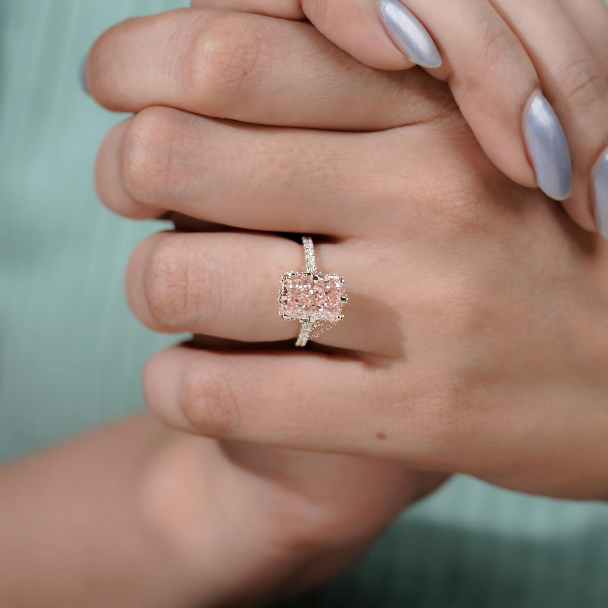 Luxury radiant pink diamond engagement ring in yellow gold