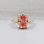 Radiant pink diamond hidden halo engagement ring in yellow gold