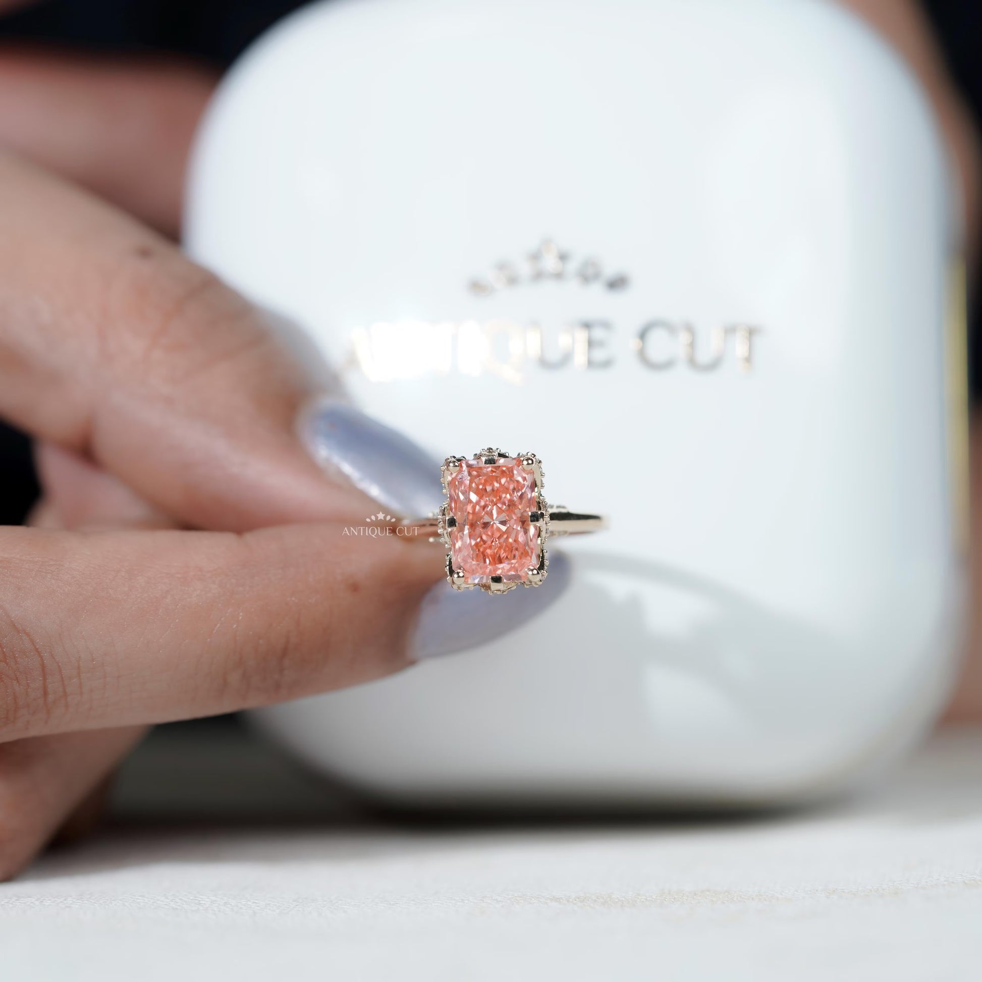 Classic yellow gold radiant pink diamond ring