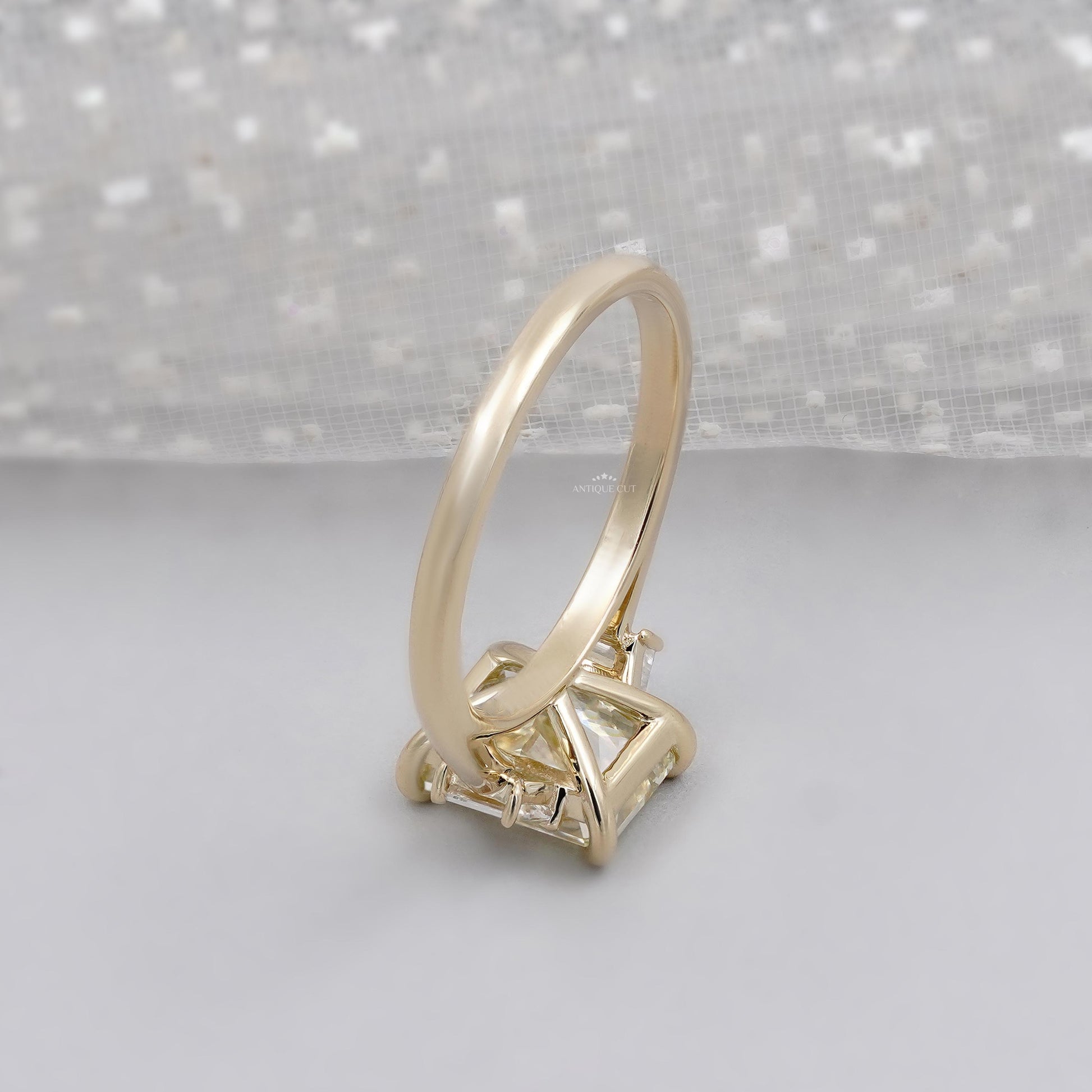 Antiquecut radiant fancy yellow diamond ring