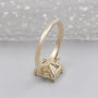 Lab grown radiant yellow diamond ring with trapezoid accents
