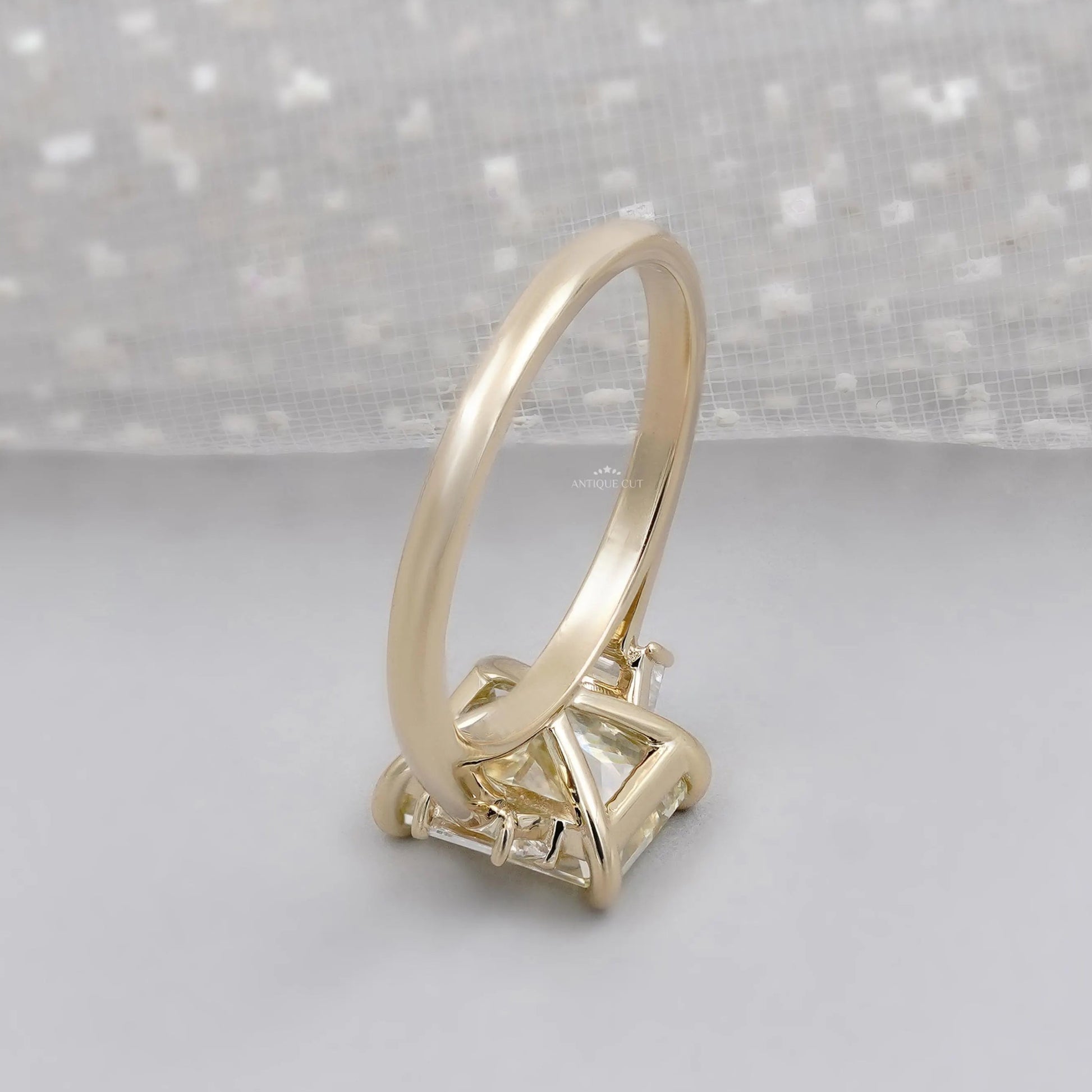 Lab grown radiant yellow diamond ring with trapezoid accents