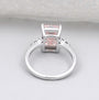 Lab grown emerald cut pink solitaire ring