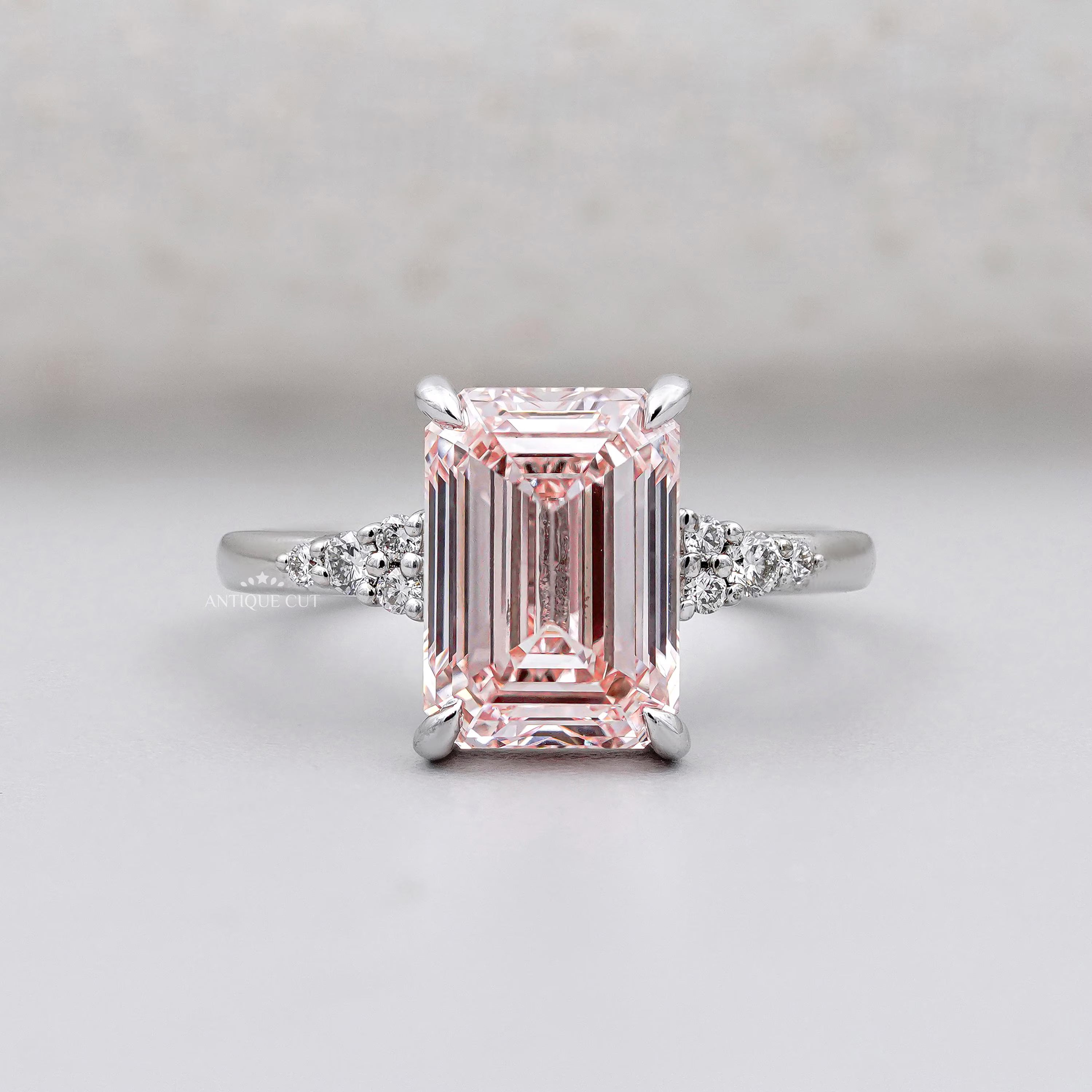 Emerald cut pink solitaire ring in white gold