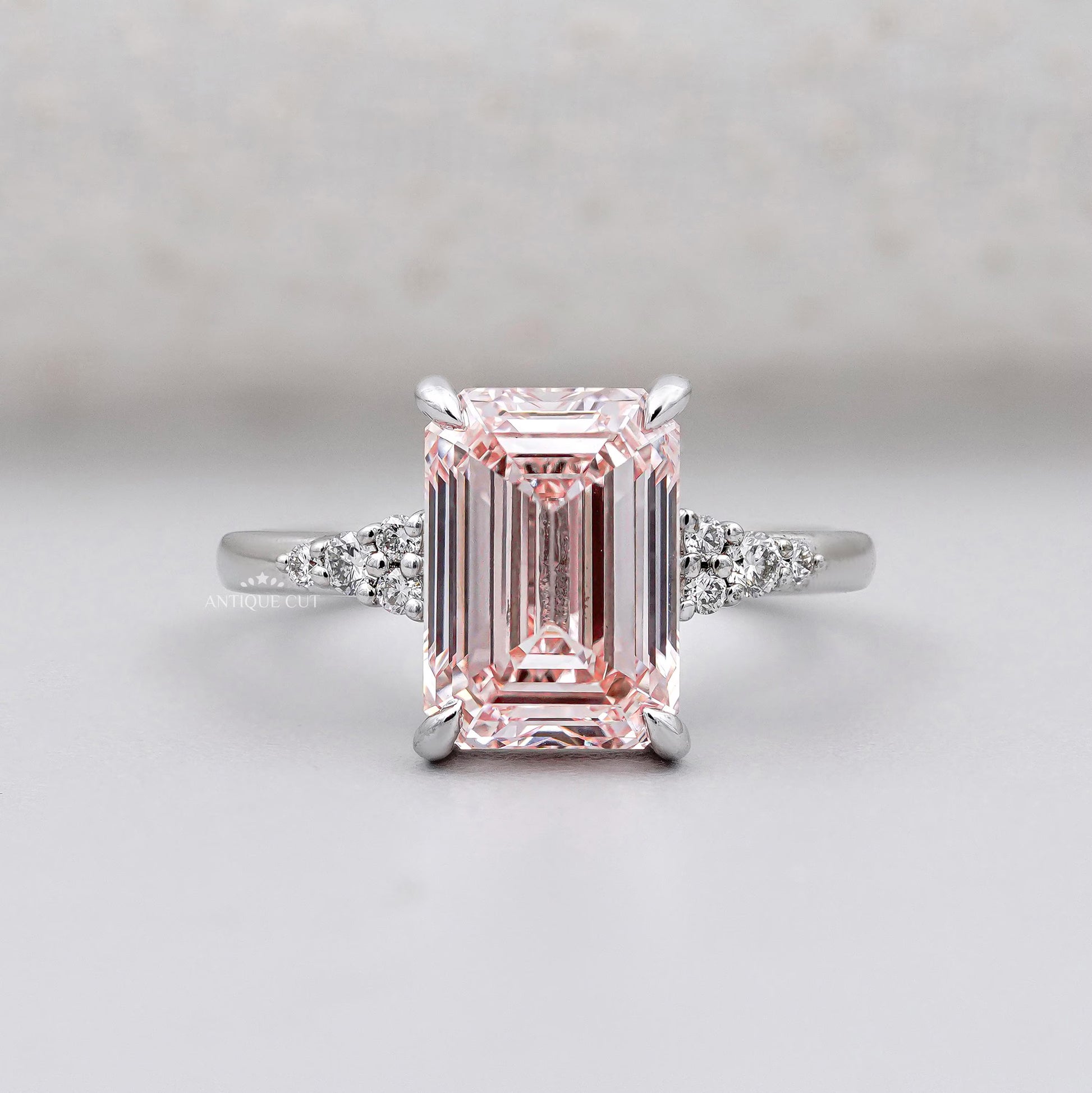 Emerald cut pink solitaire ring in white gold