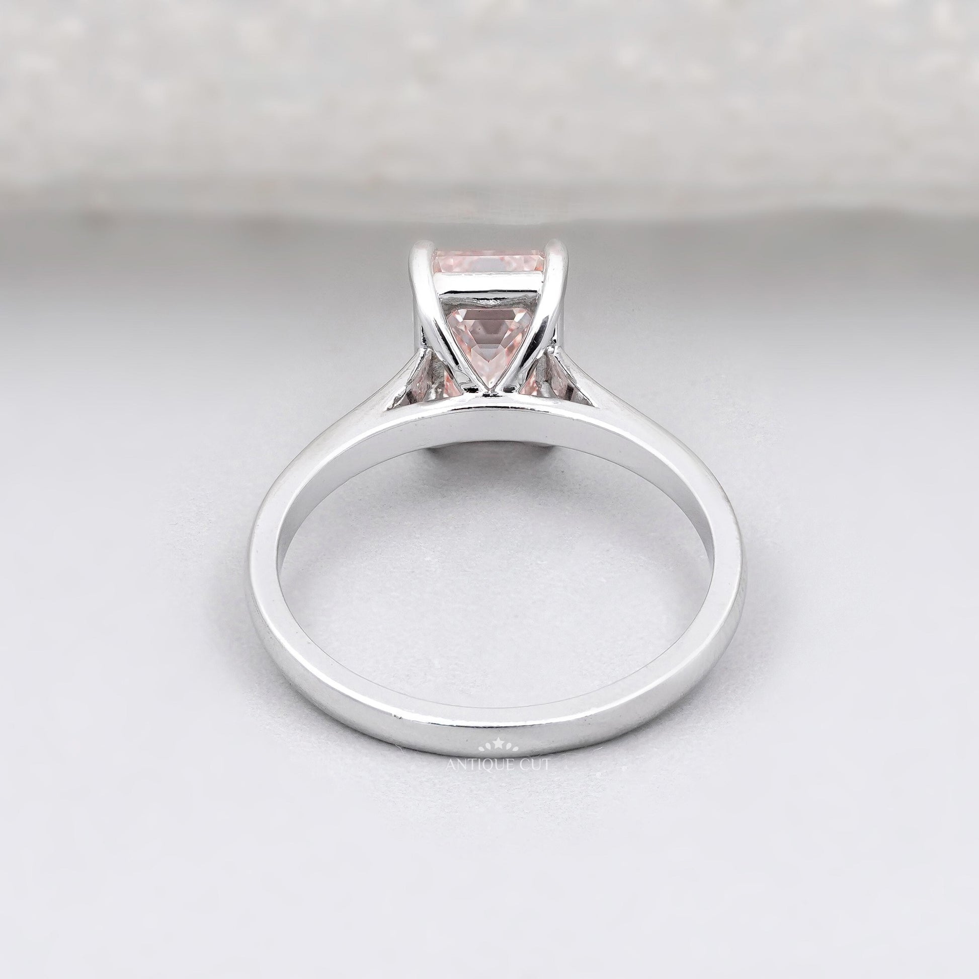Elegant modern pink solitaire engagement ring
