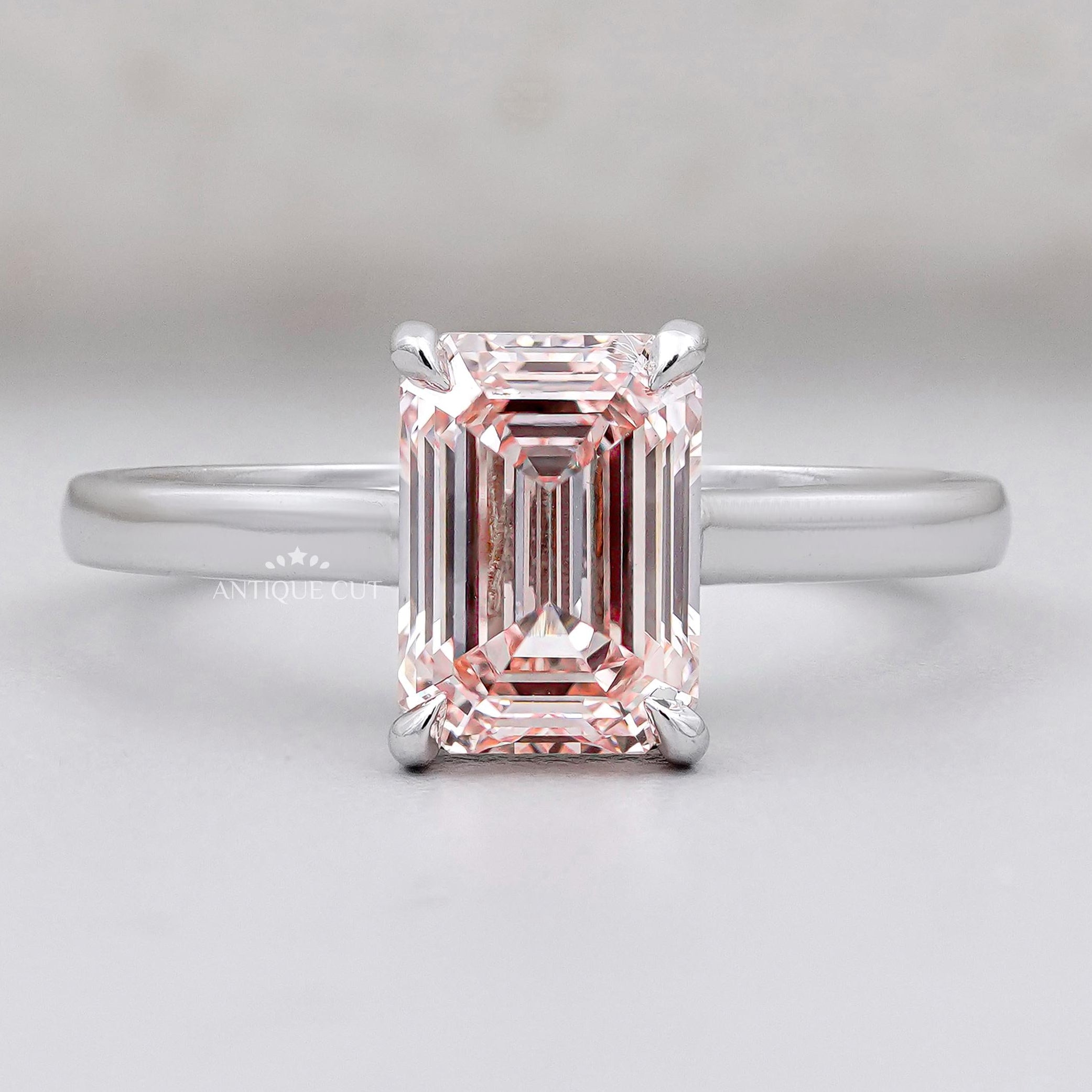 Modern emerald cut pink diamond solitaire ring in white gold
