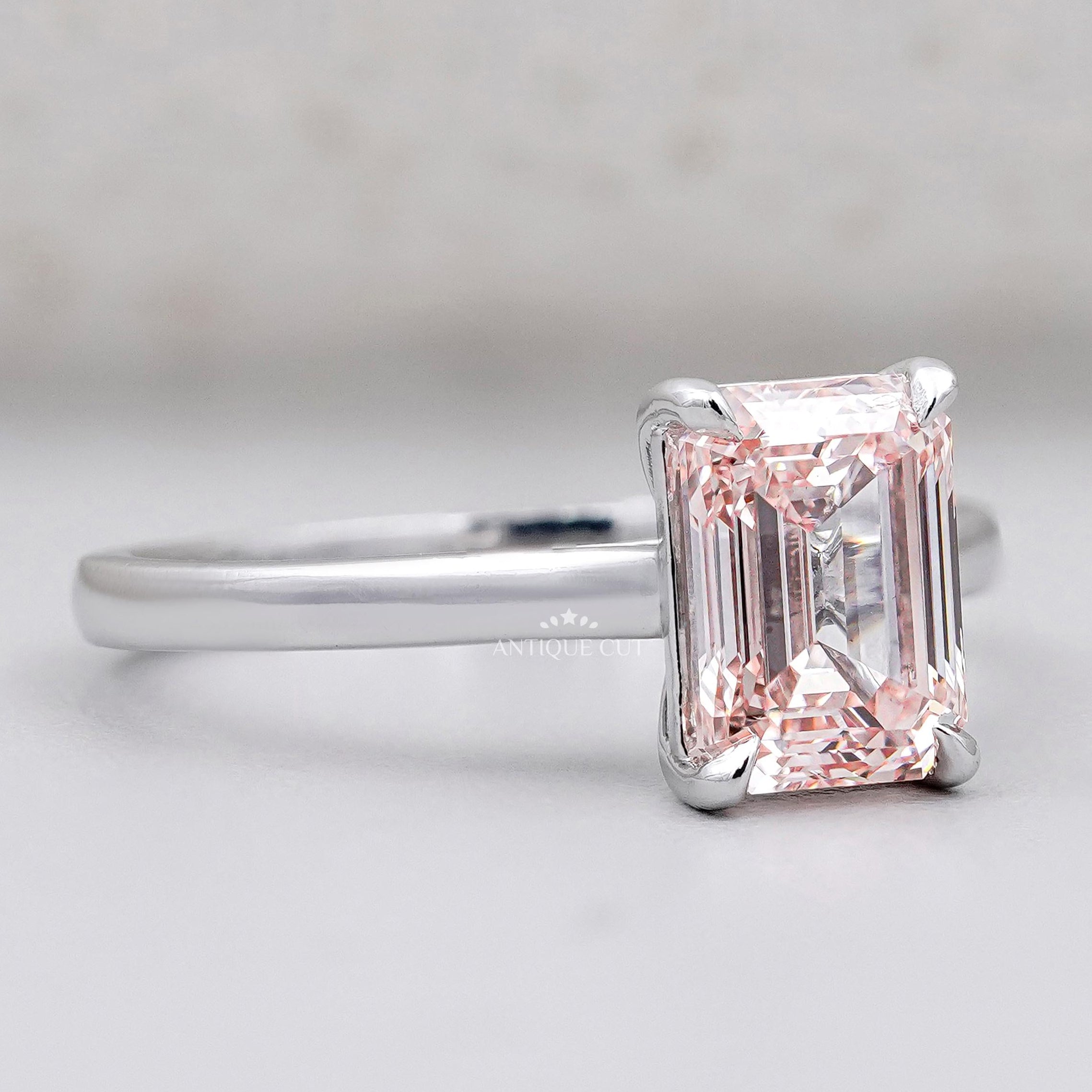 White gold pink emerald cut engagement ring