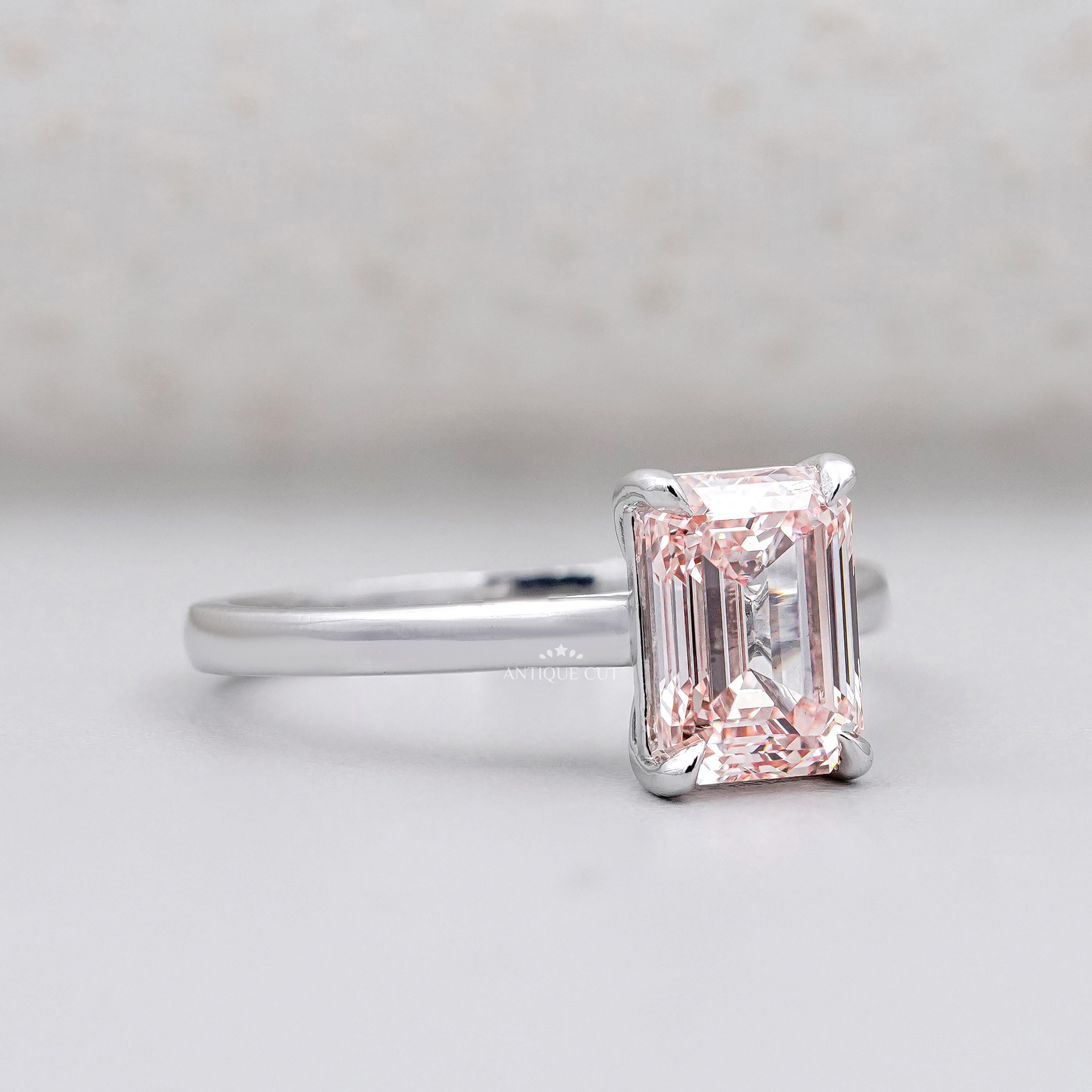 White gold pink emerald cut engagement ring