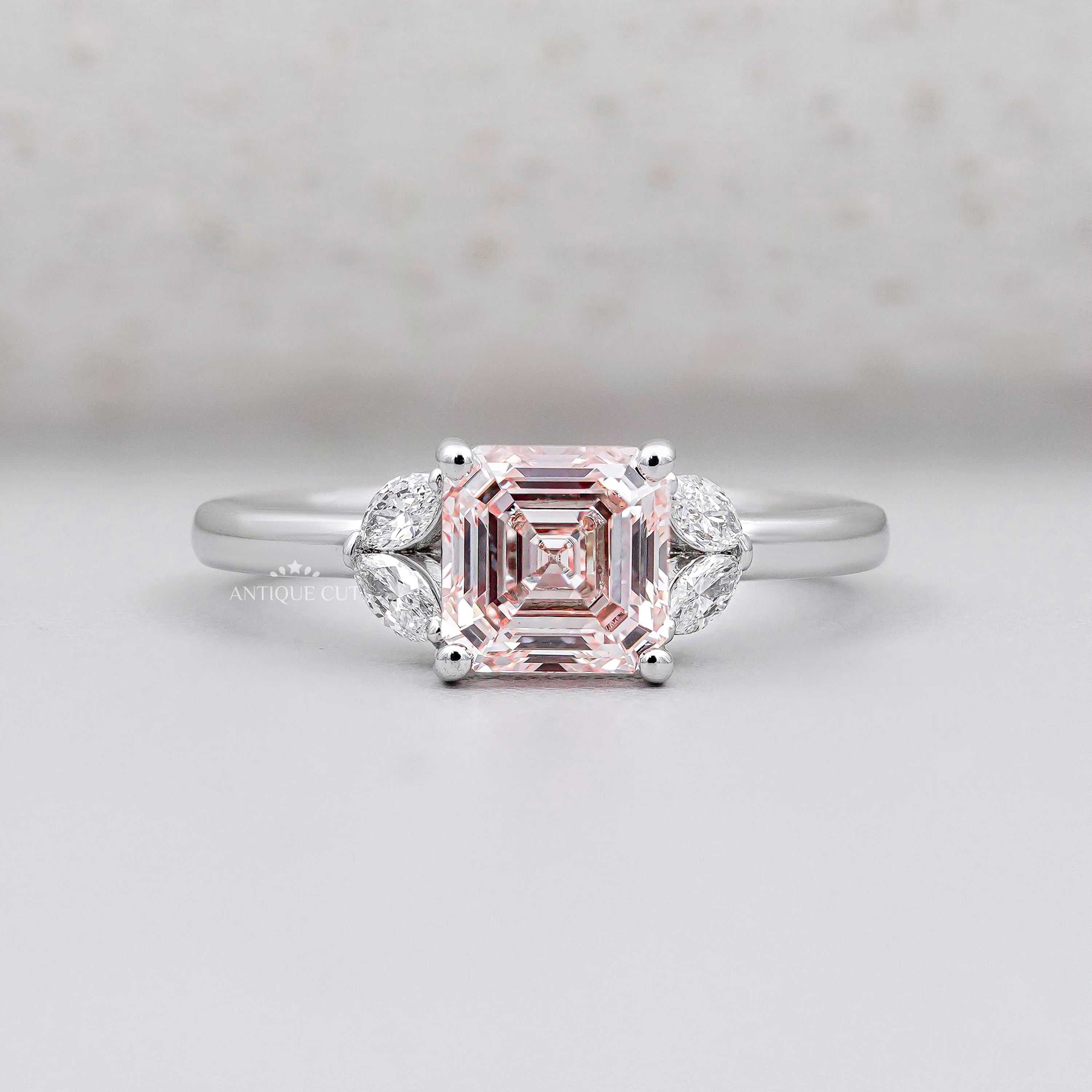 Blush pink Asscher cut diamond ring in white gold