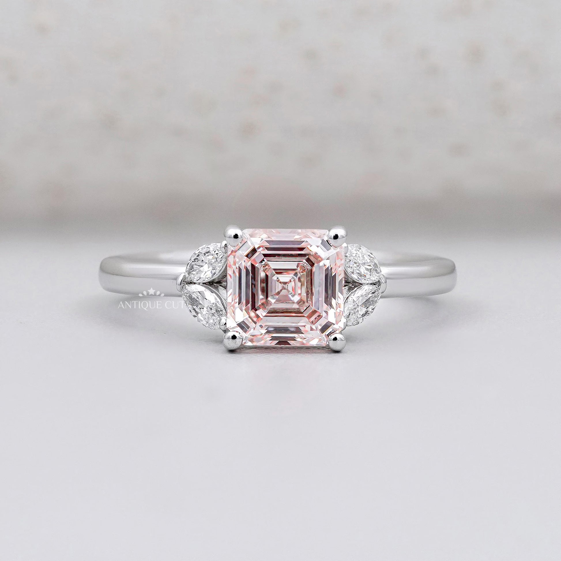Blush pink Asscher cut diamond ring in white gold