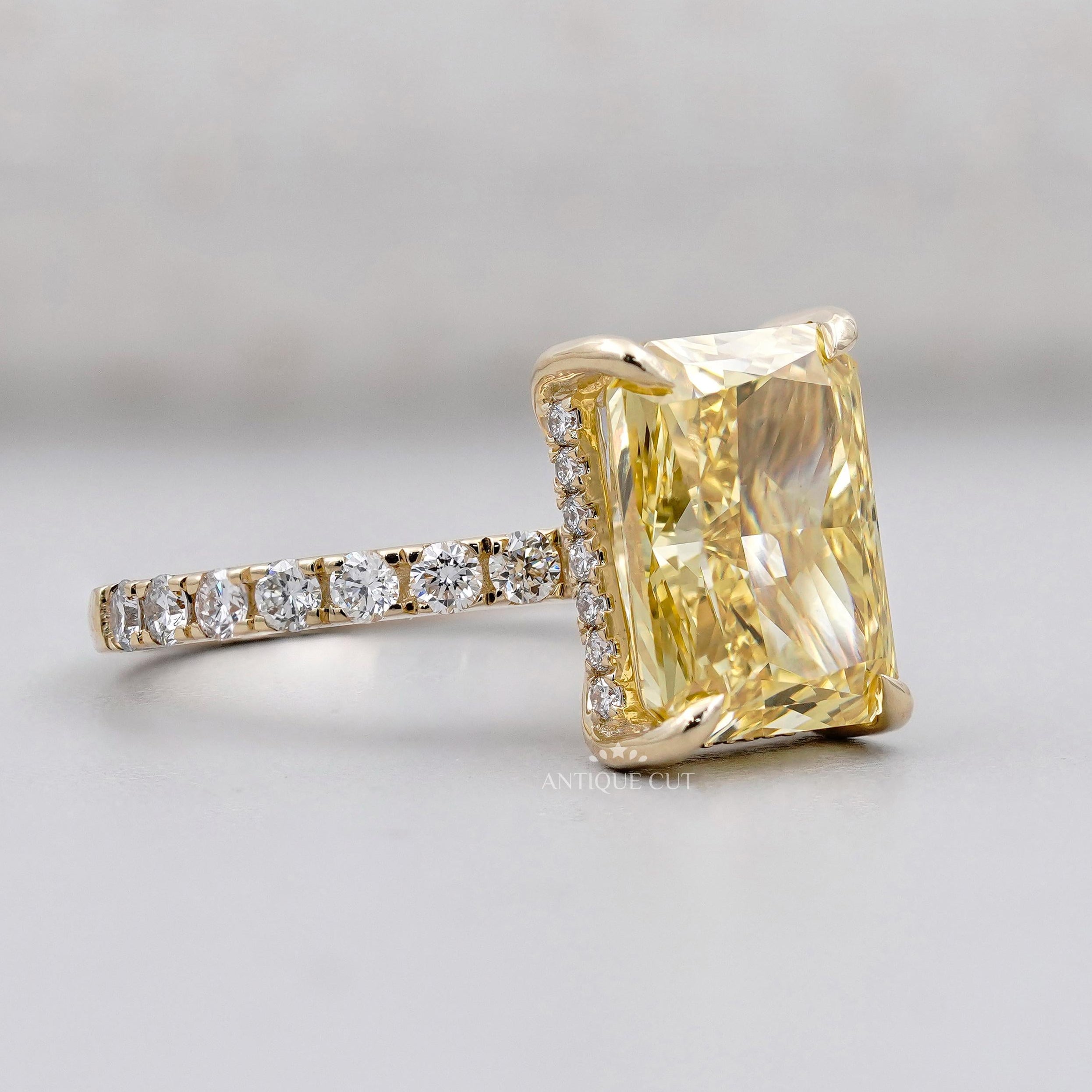 Yellow gold radiant fancy yellow diamond engagement ring