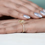Modern yellow gold radiant fancy yellow diamond ring