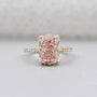 Radiant pink diamond hidden halo engagement ring in yellow gold