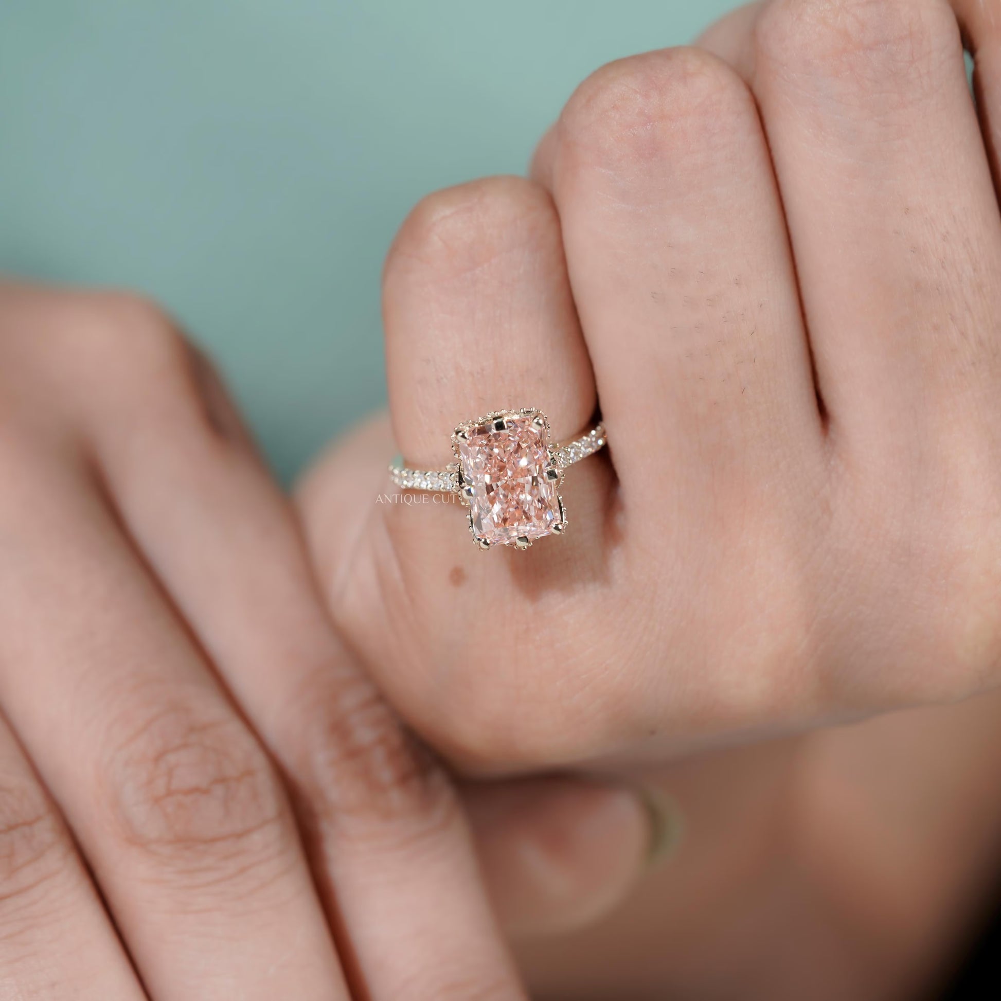 Elegant pave band radiant pink diamond ring