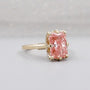 Elegant pink diamond ring with hidden halo setting