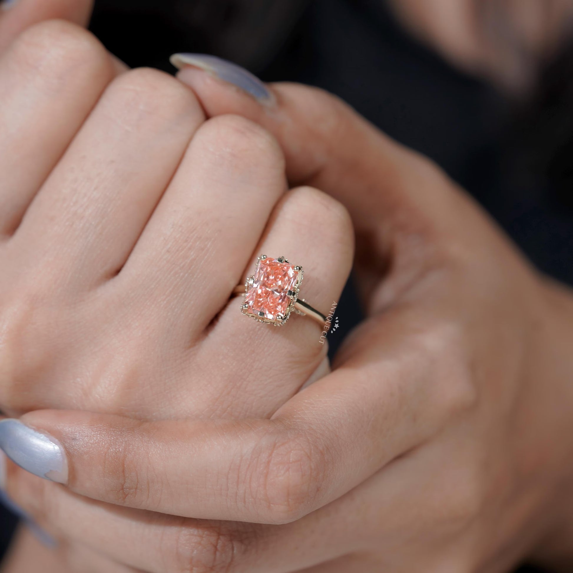 Statement pink diamond ring with hidden halo
