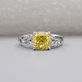 Yellow Cushion Cut Diamond Engagement Ring In White Gold With Marquise & Round Side Diamond IGI Certified