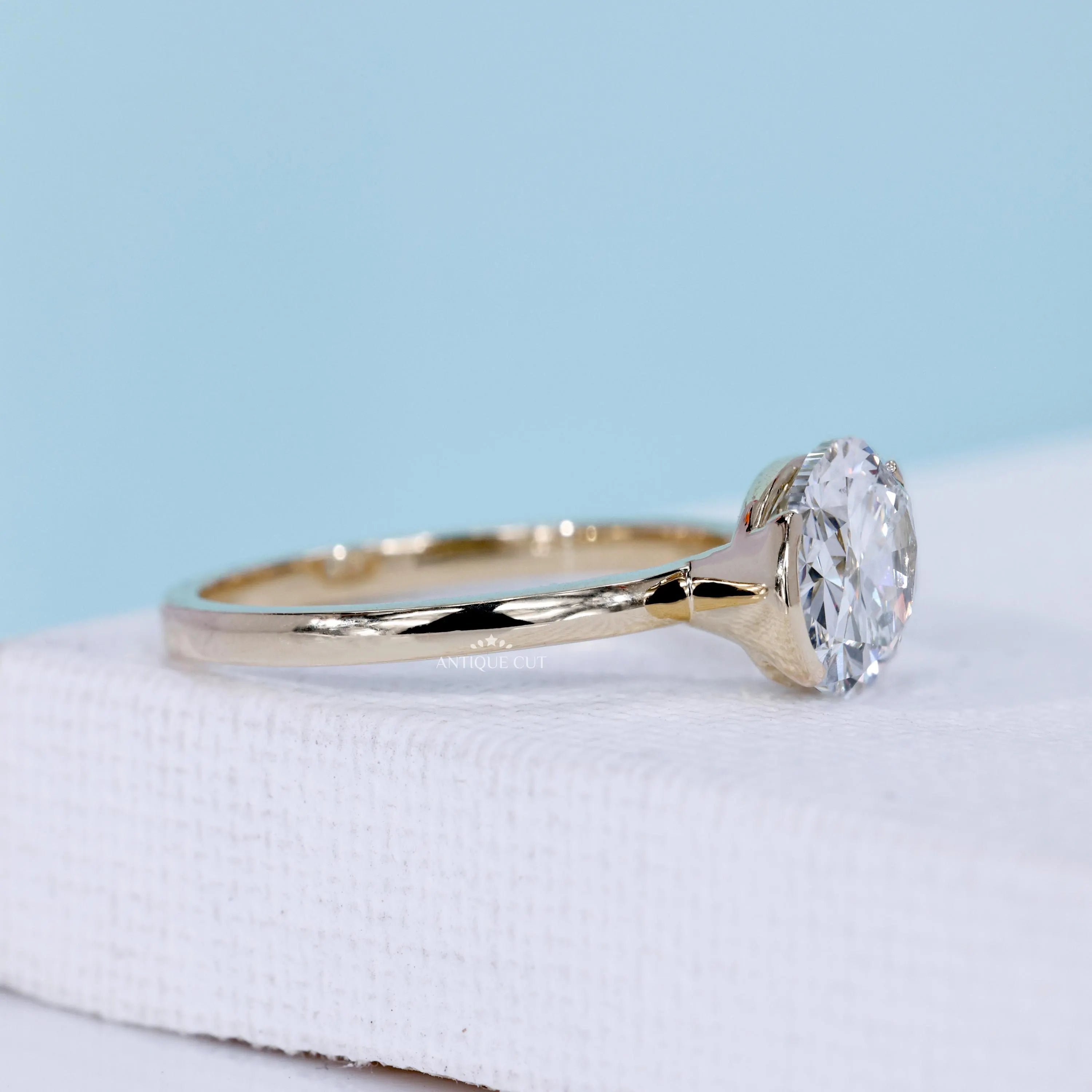 Antiquecut east west oval engagement ring