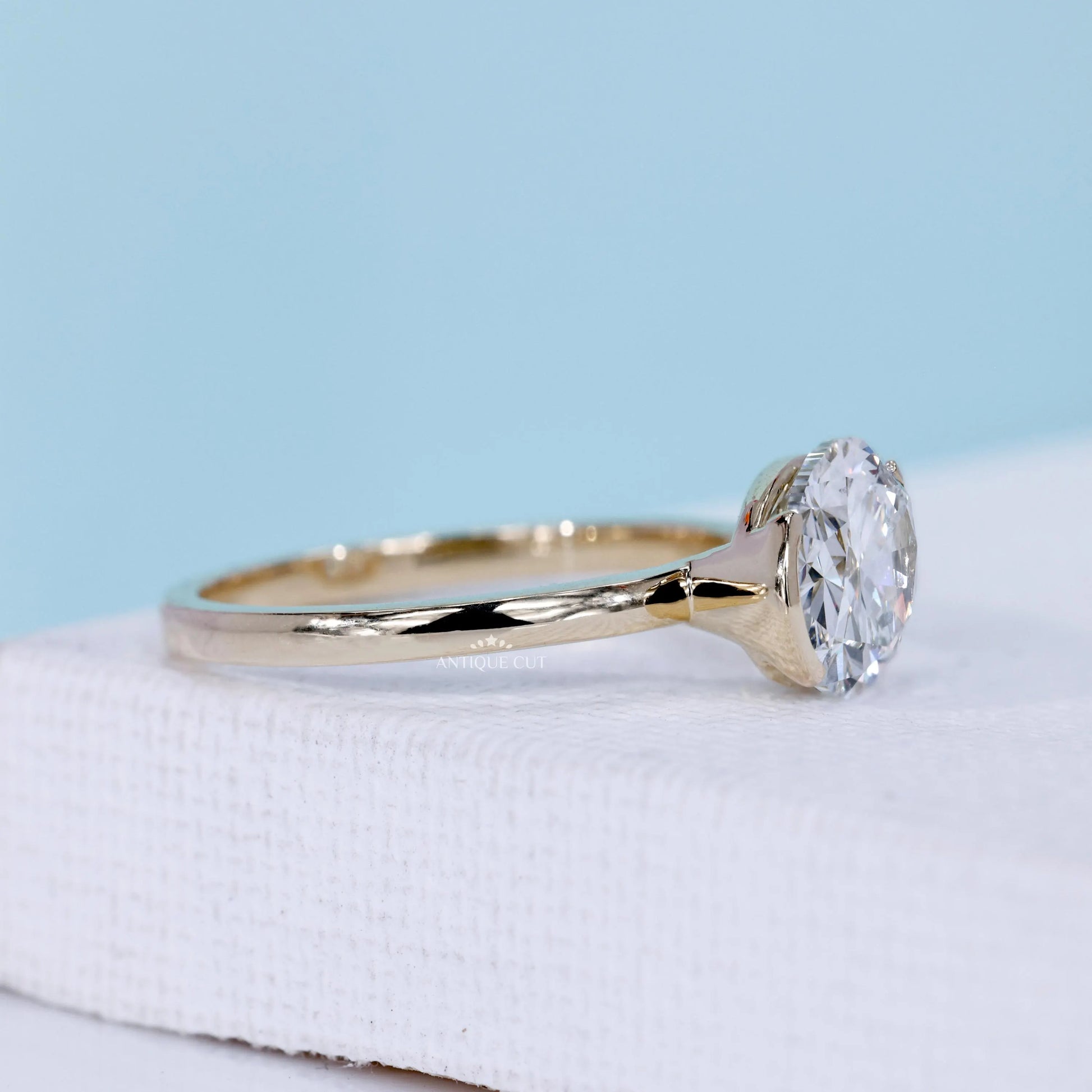 Antiquecut east west oval engagement ring