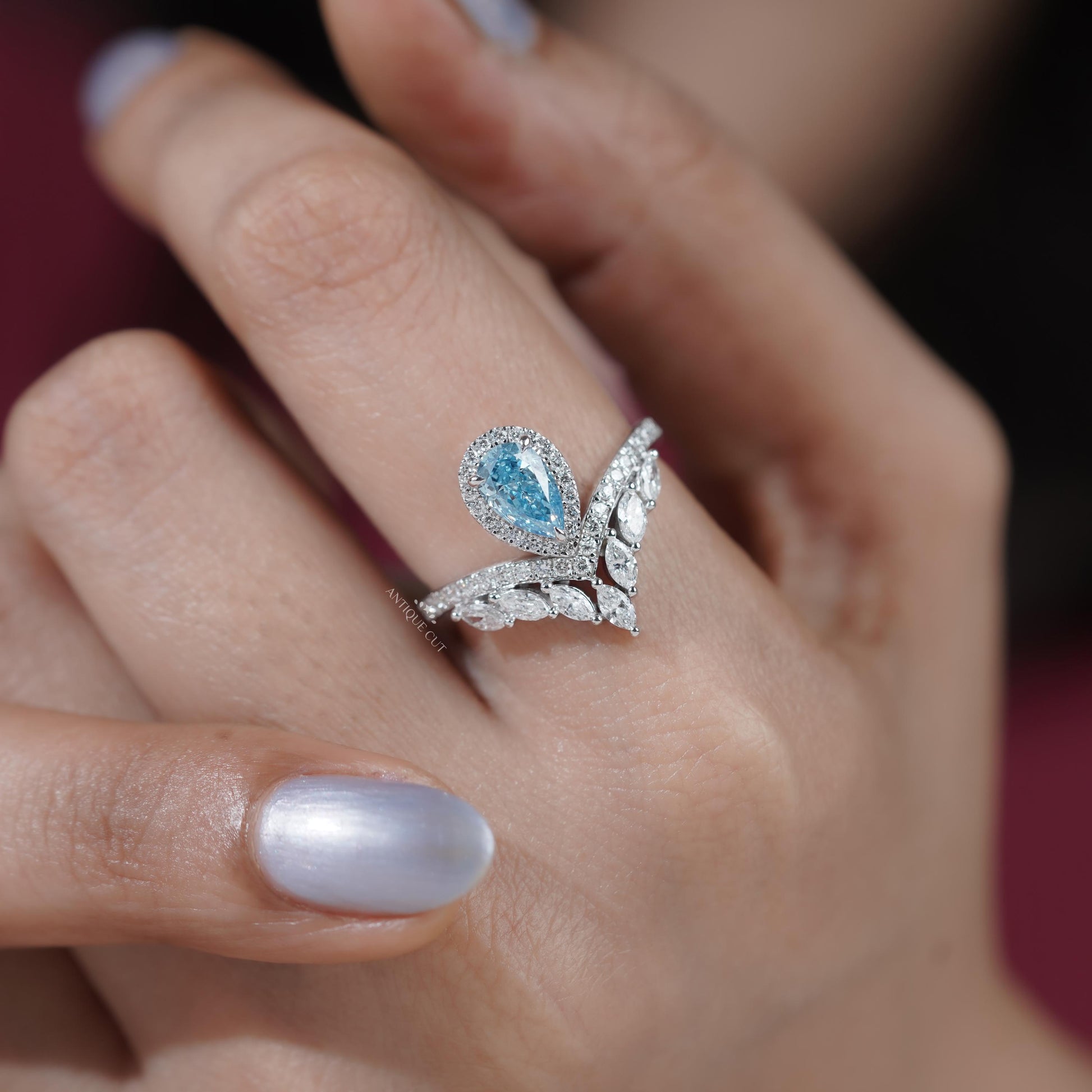 Fine jewelry pear cut blue diamond halo ring