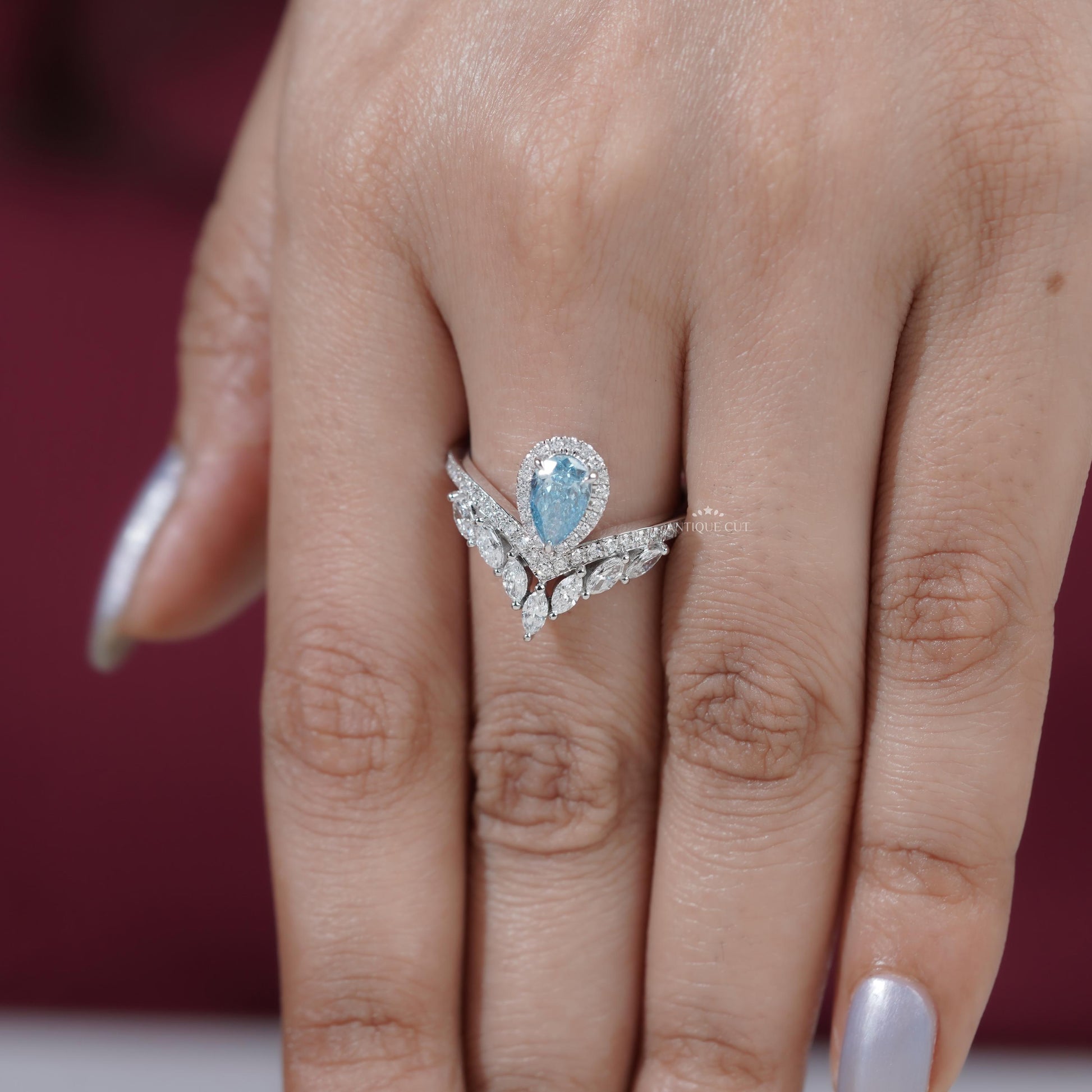 Bridal engagement ring pear cut blue diamond