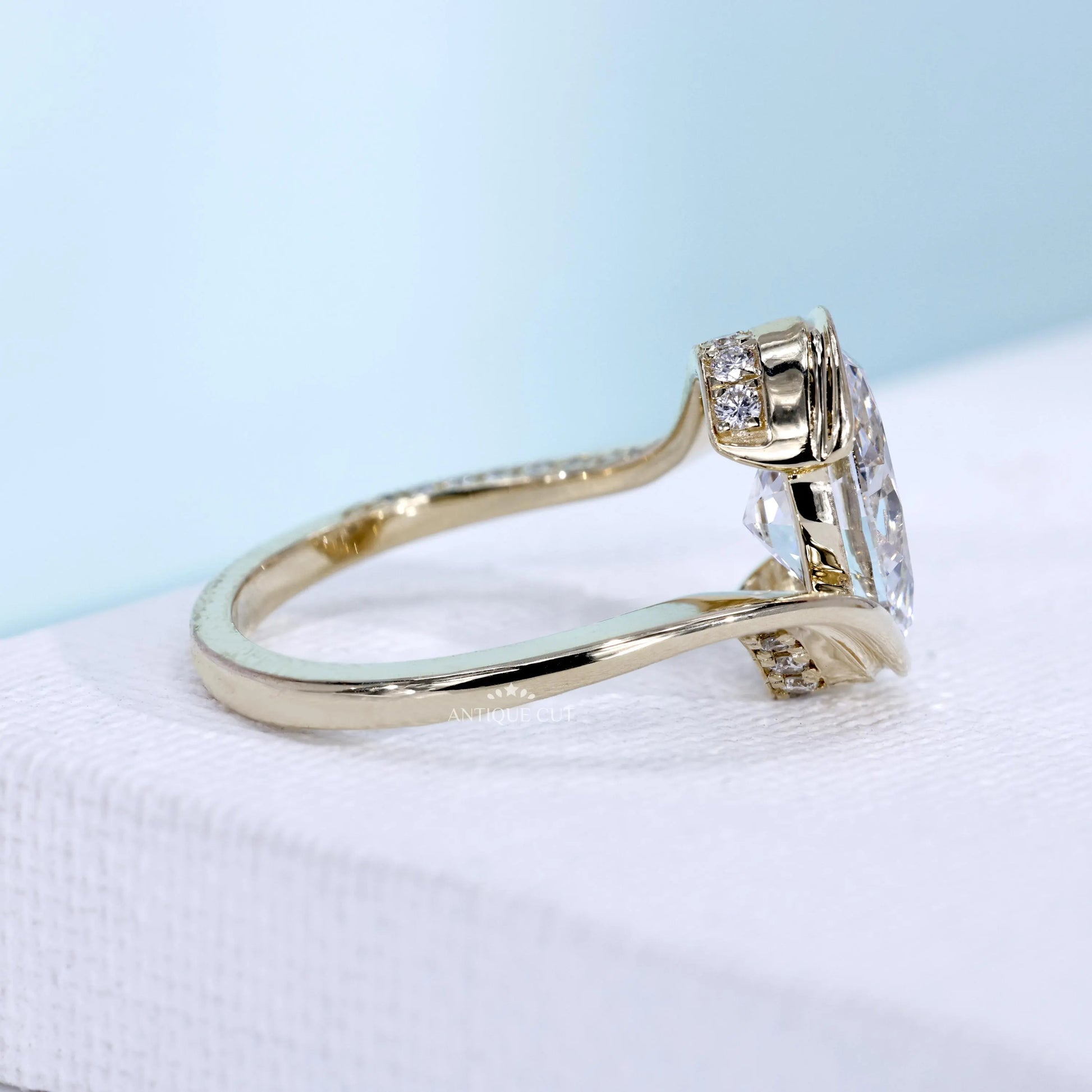 Antiquecut lab grown diamond bypass solitaire ring