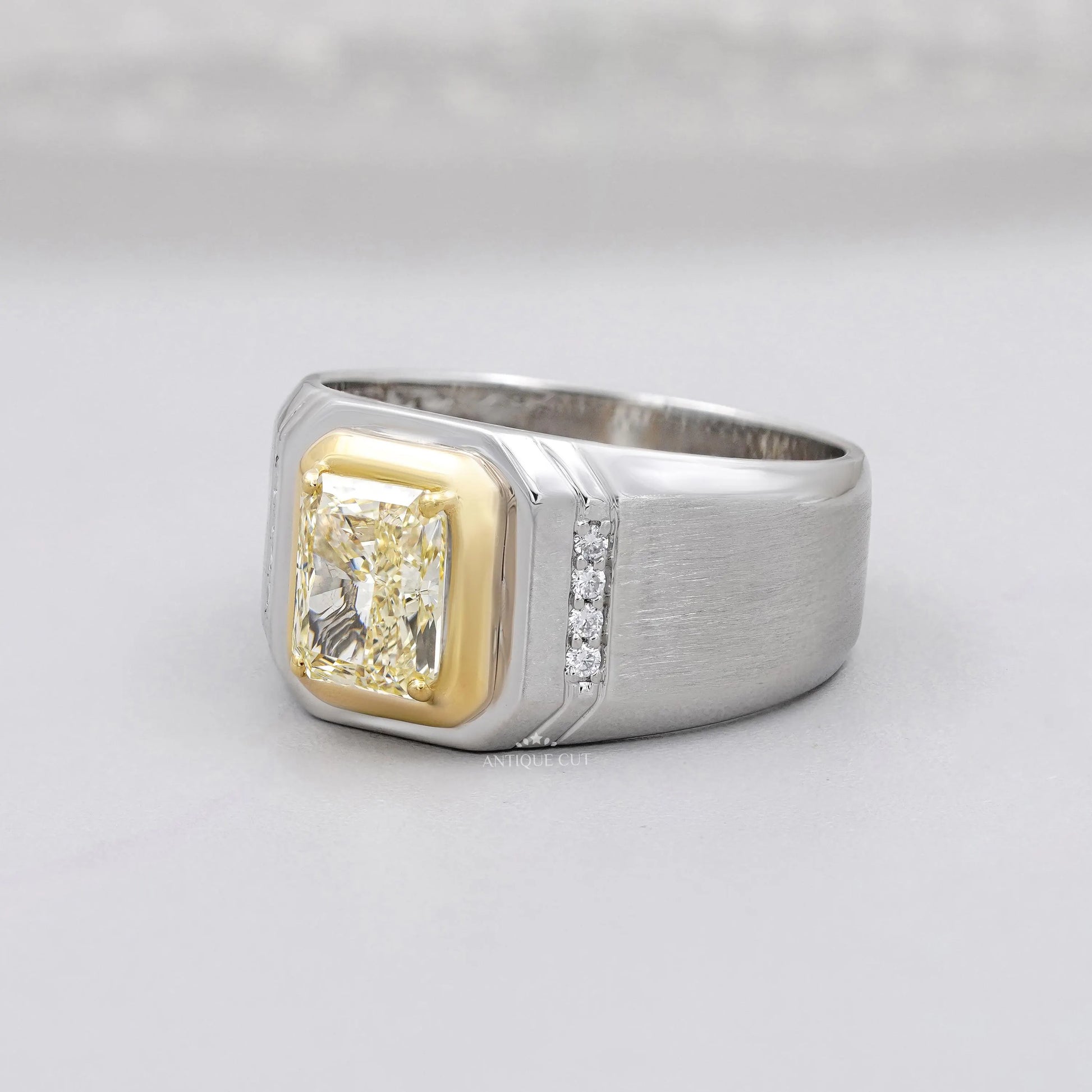Antiquecut yellow cushion cut diamond ring