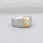 Cushion cut engagement ring with wide bezel band