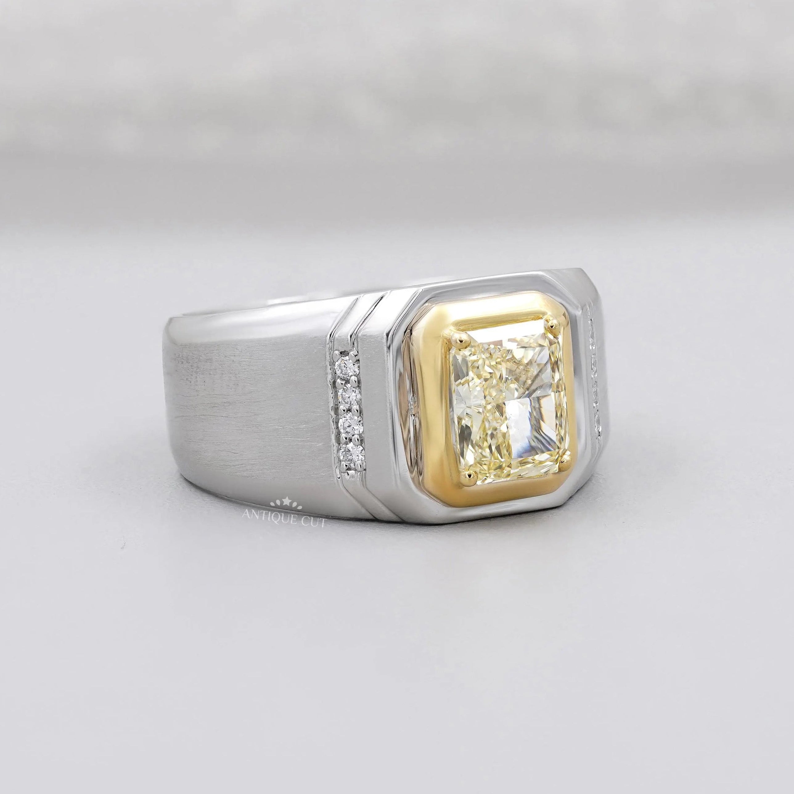 Radiant cut yellow diamond men's engagement ring with white gold bezel