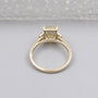 Elegant radiant yellow diamond ring with trapezoid side stones