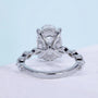 White gold oval engagement ring with hidden halo