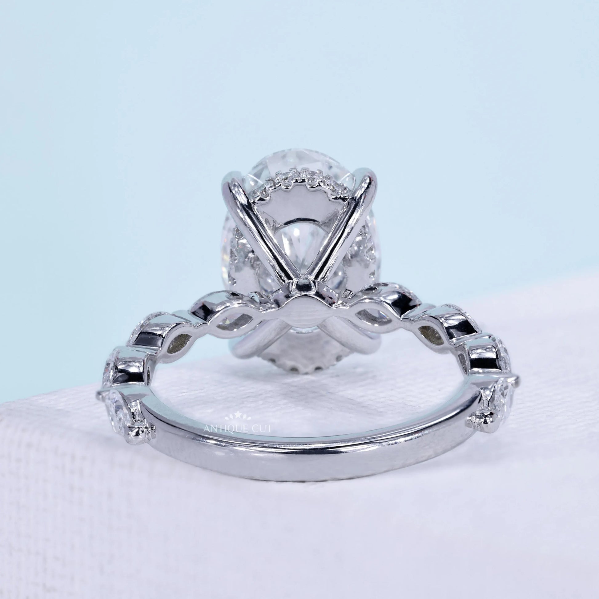White gold oval engagement ring with hidden halo