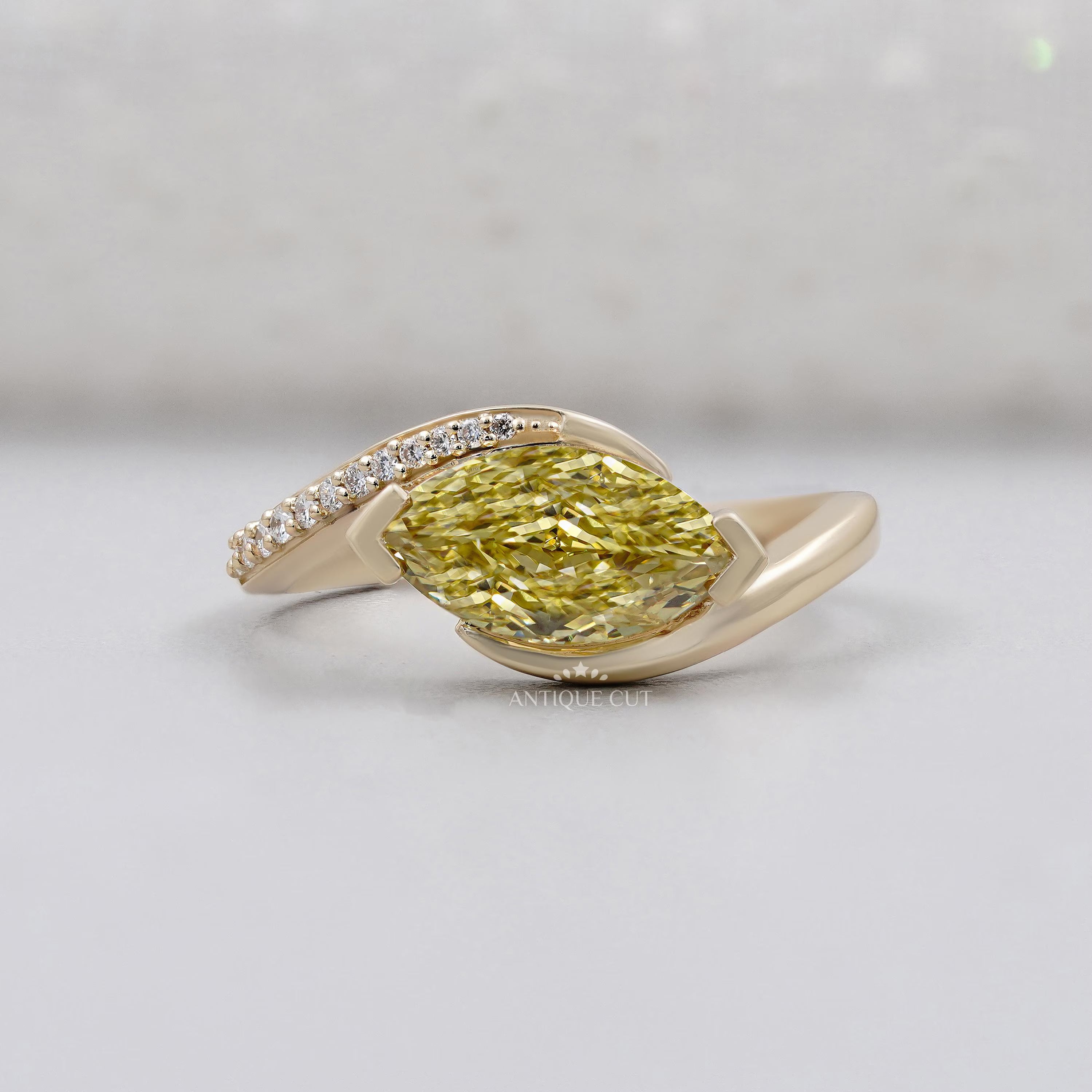 Marquise Cut Fancy Yellow Diamond Bypass Engagement Ring