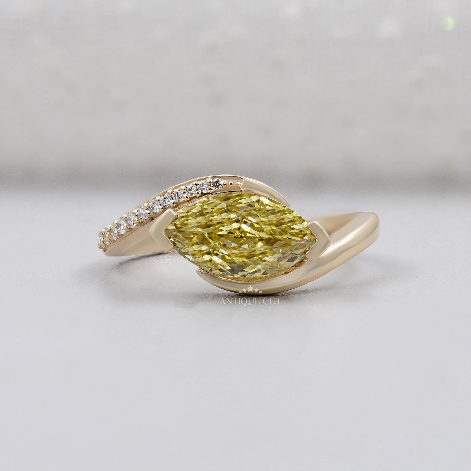 Marquise Cut Fancy Yellow Diamond Bypass Engagement Ring