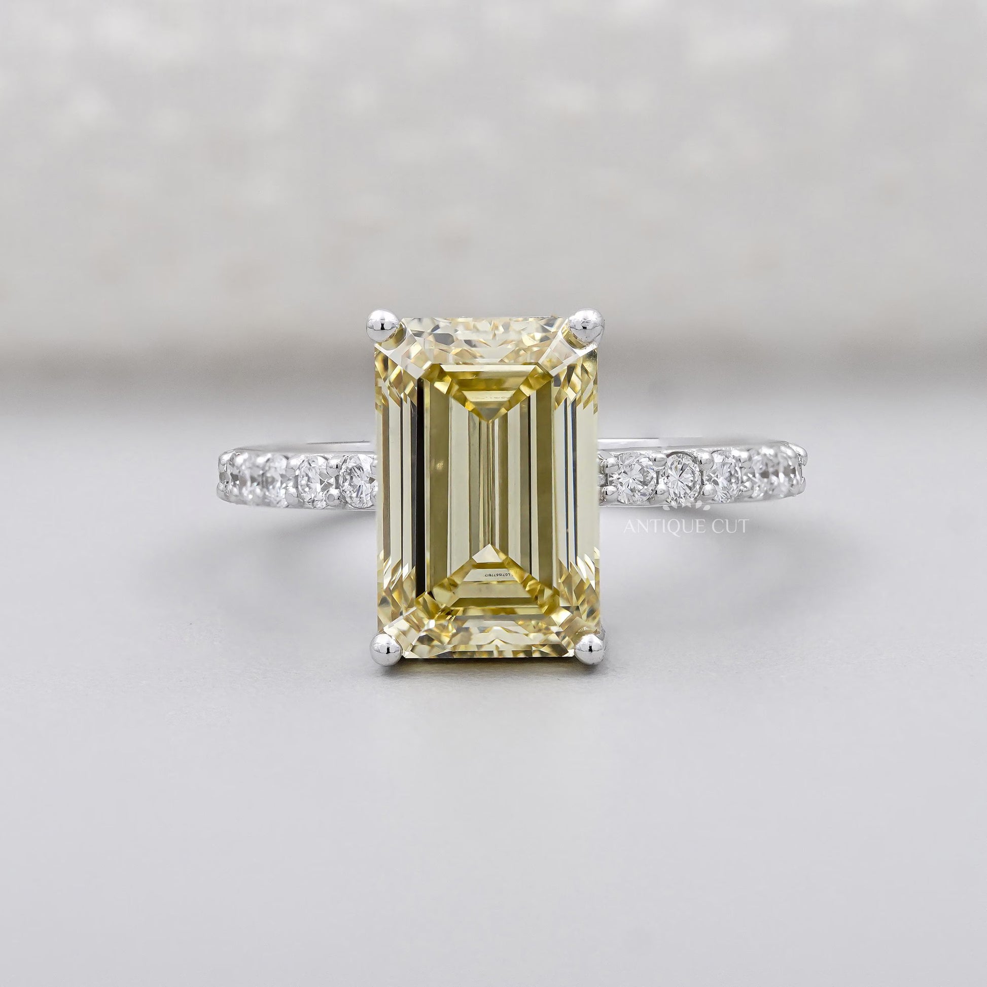 Emerald Cut Fancy Yellow Diamond Solitaire Ring