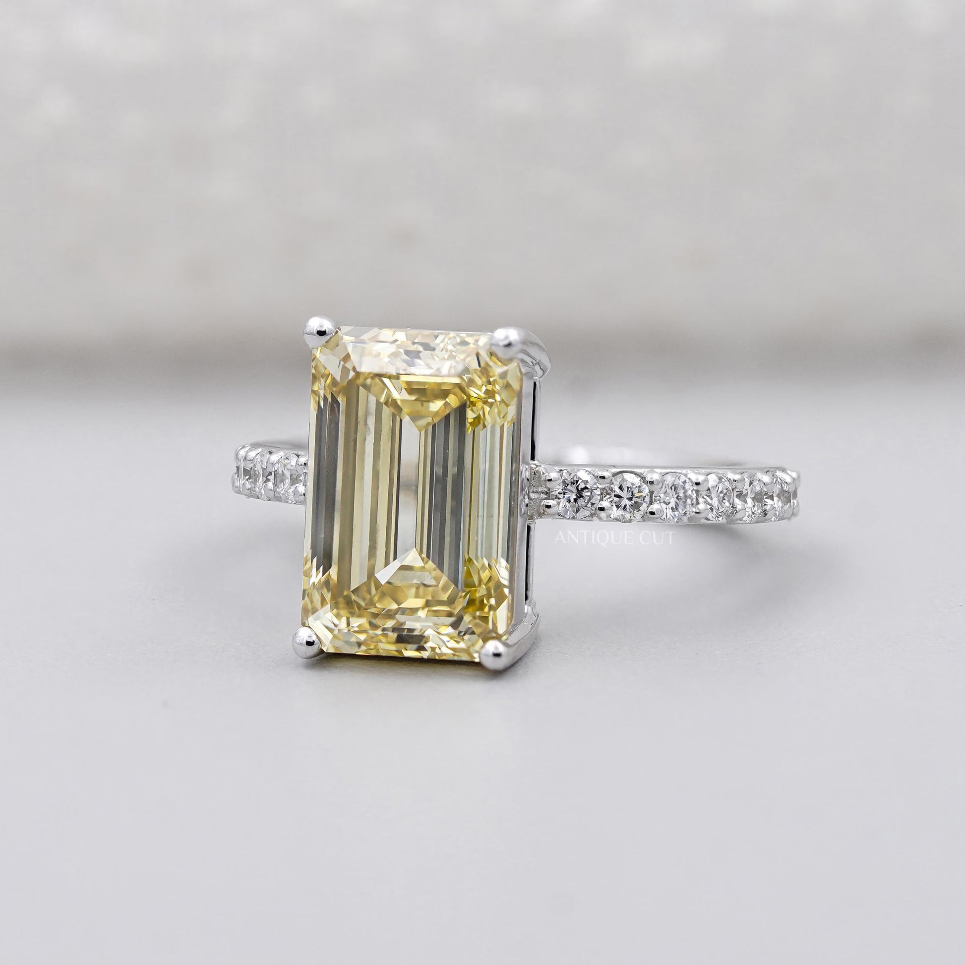 Antiquecut emerald cut yellow diamond ring