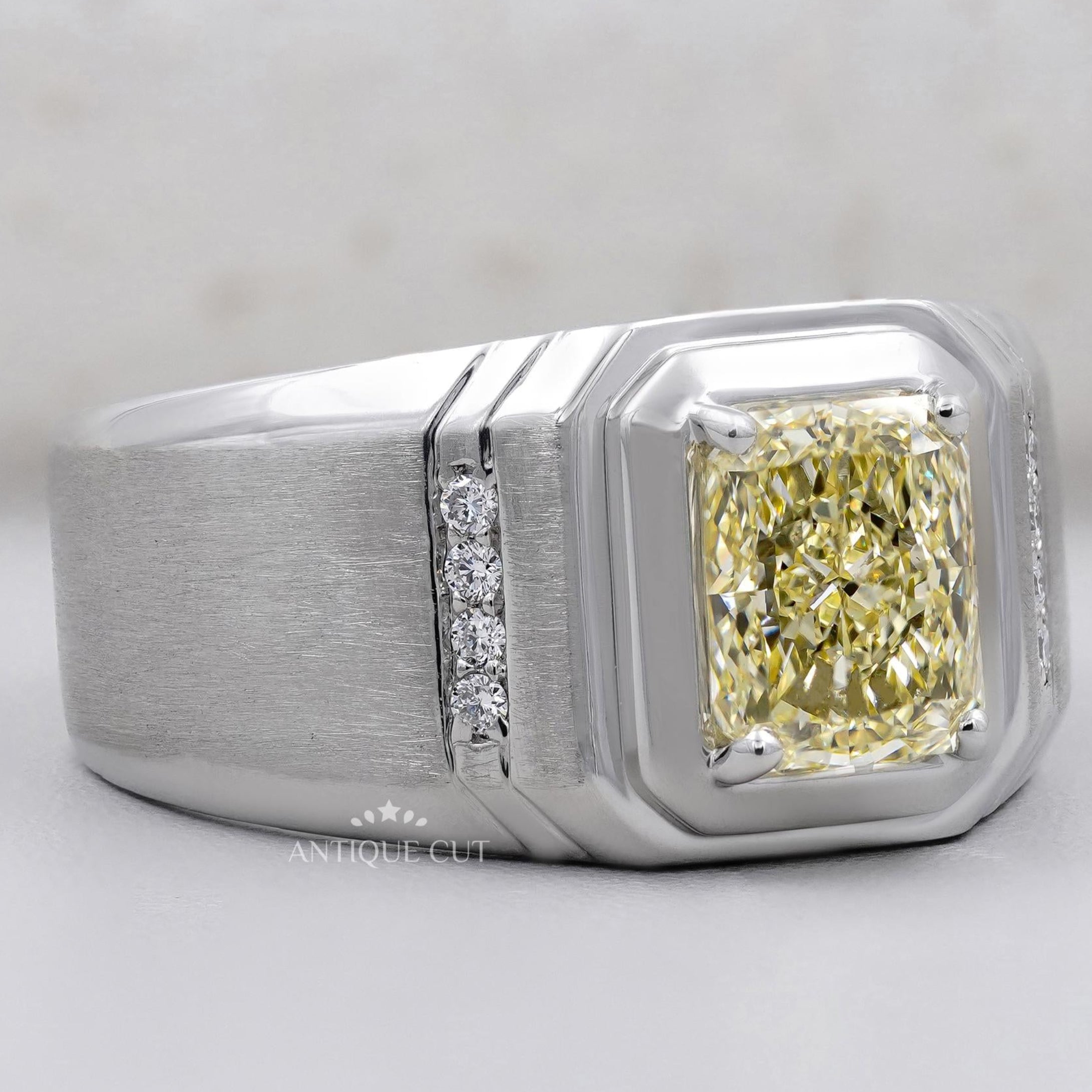 Yellow diamond men's engagement ring in white gold