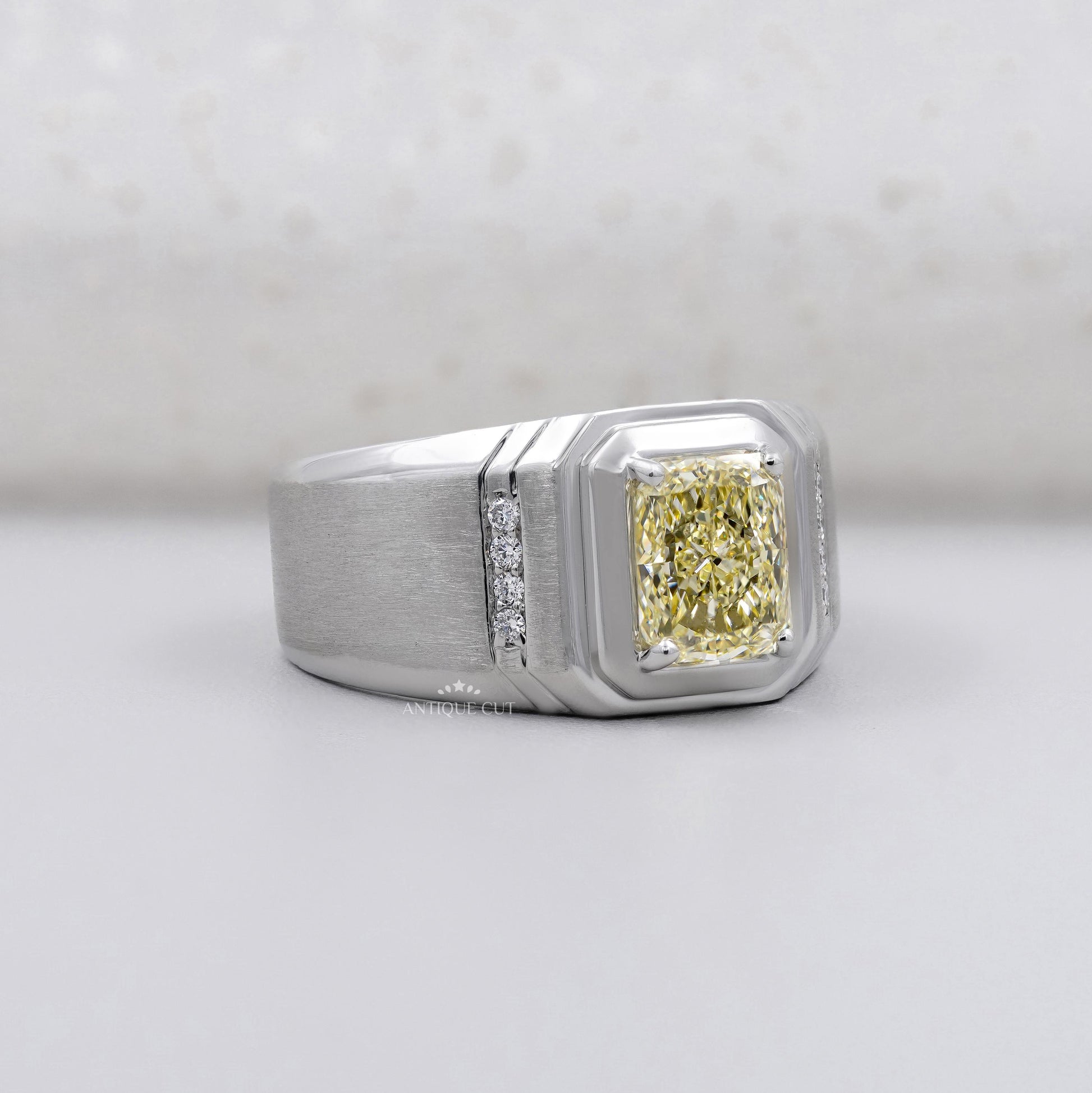 Yellow diamond men's engagement ring in white gold