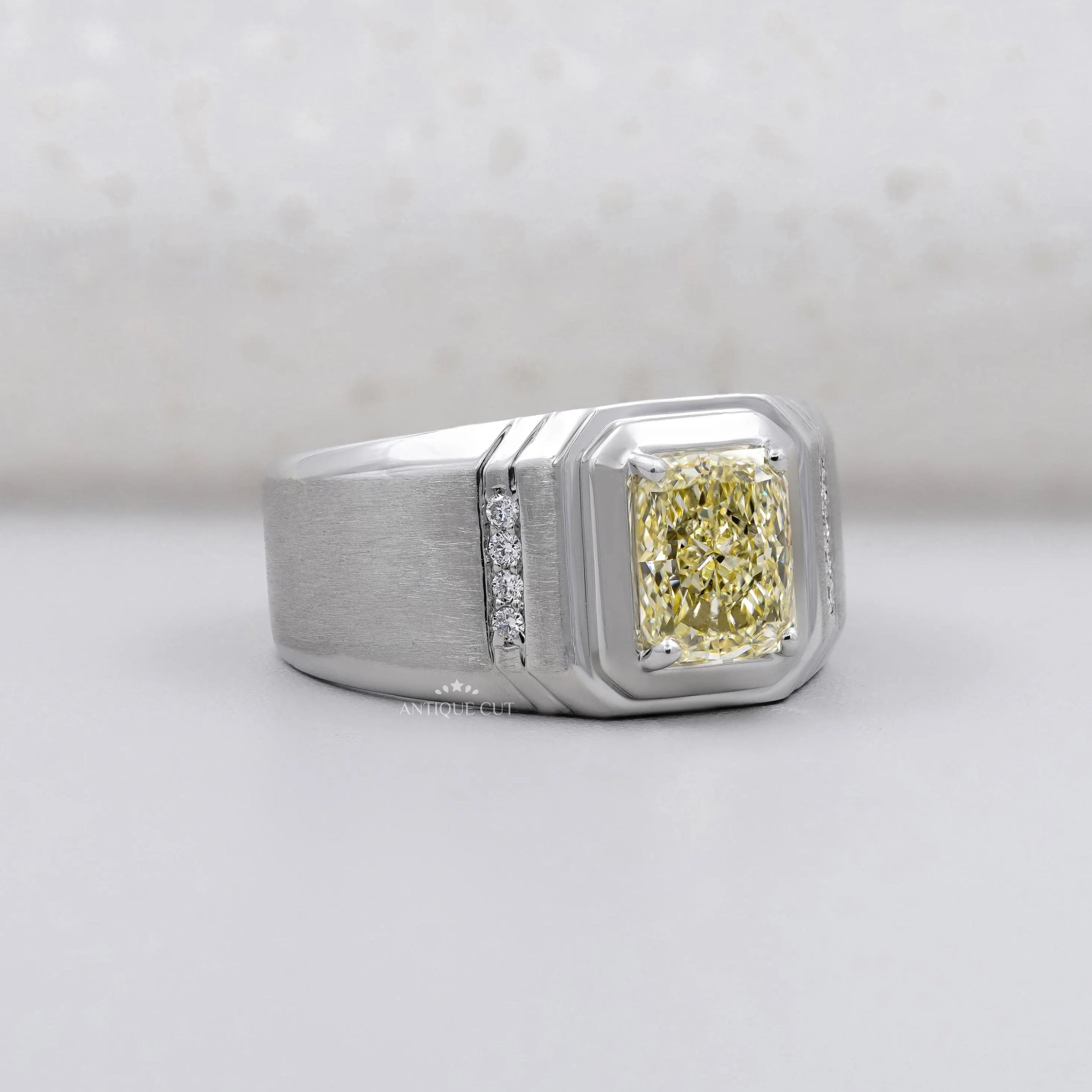 Radiant cut yellow diamond men's engagement ring in white gold