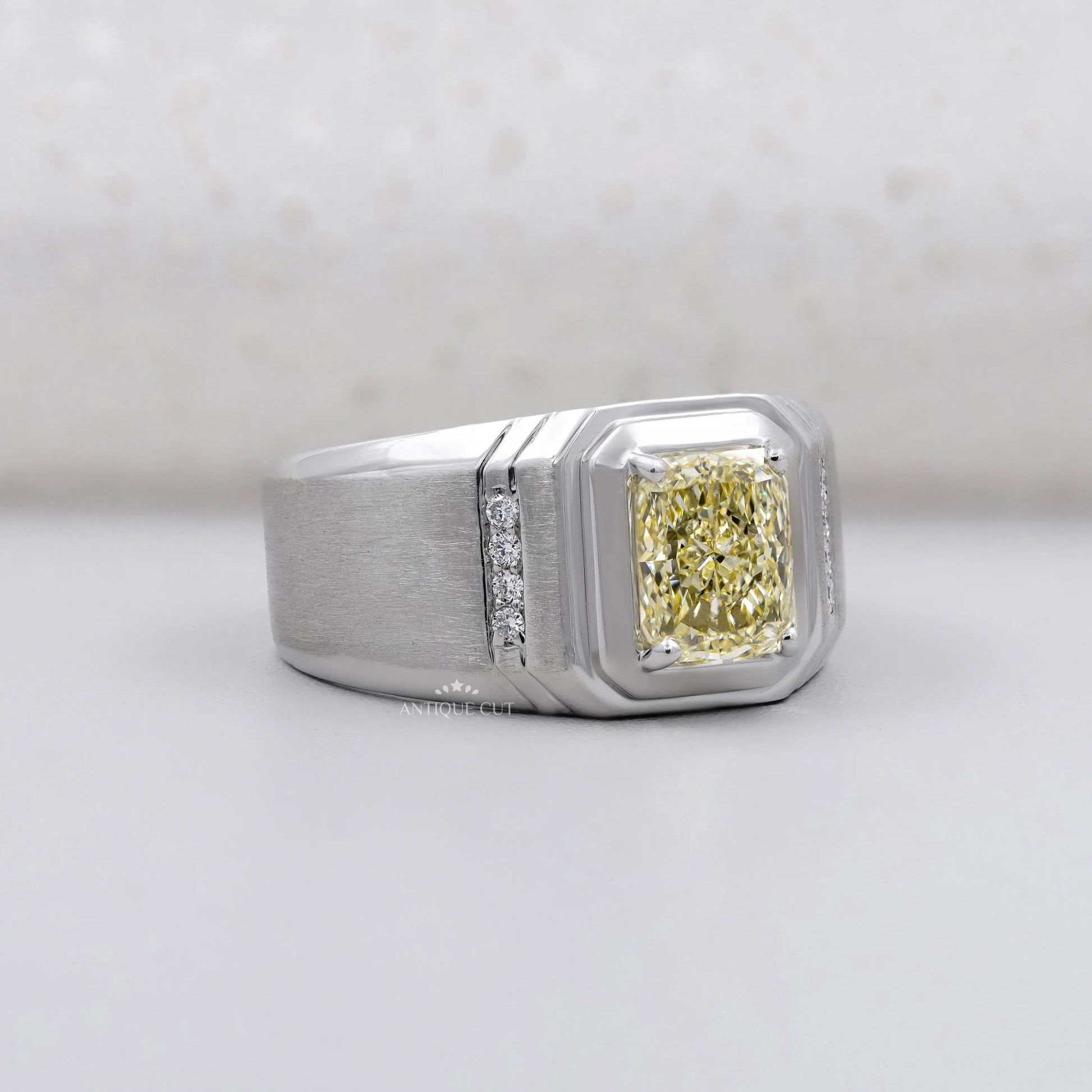 Radiant cut yellow diamond men's engagement ring in white gold