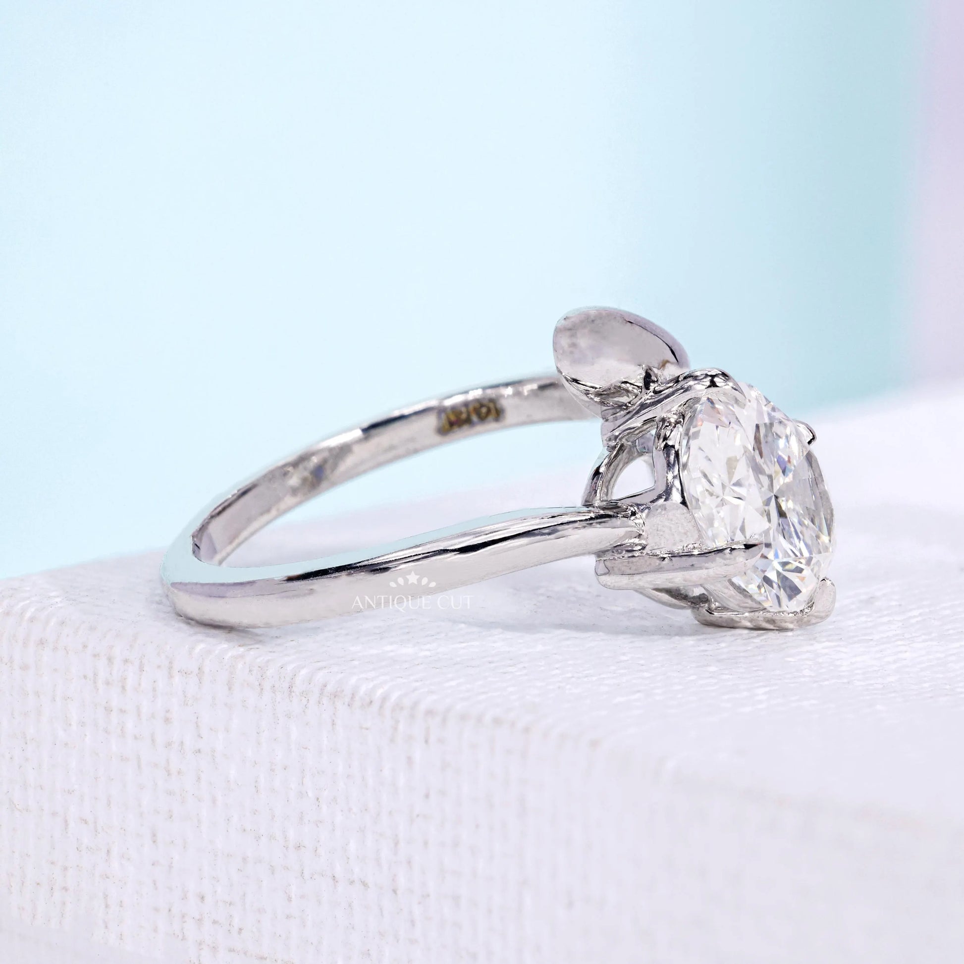 IGI certified oval diamond bypass engagement ring design