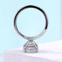 Oval center stone engagement ring with secure claw setting