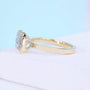 Half bezel engagement ring with radiant cut diamond and open gallery setting