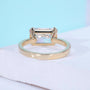 IGI certified east west radiant cut diamond ring in yellow gold