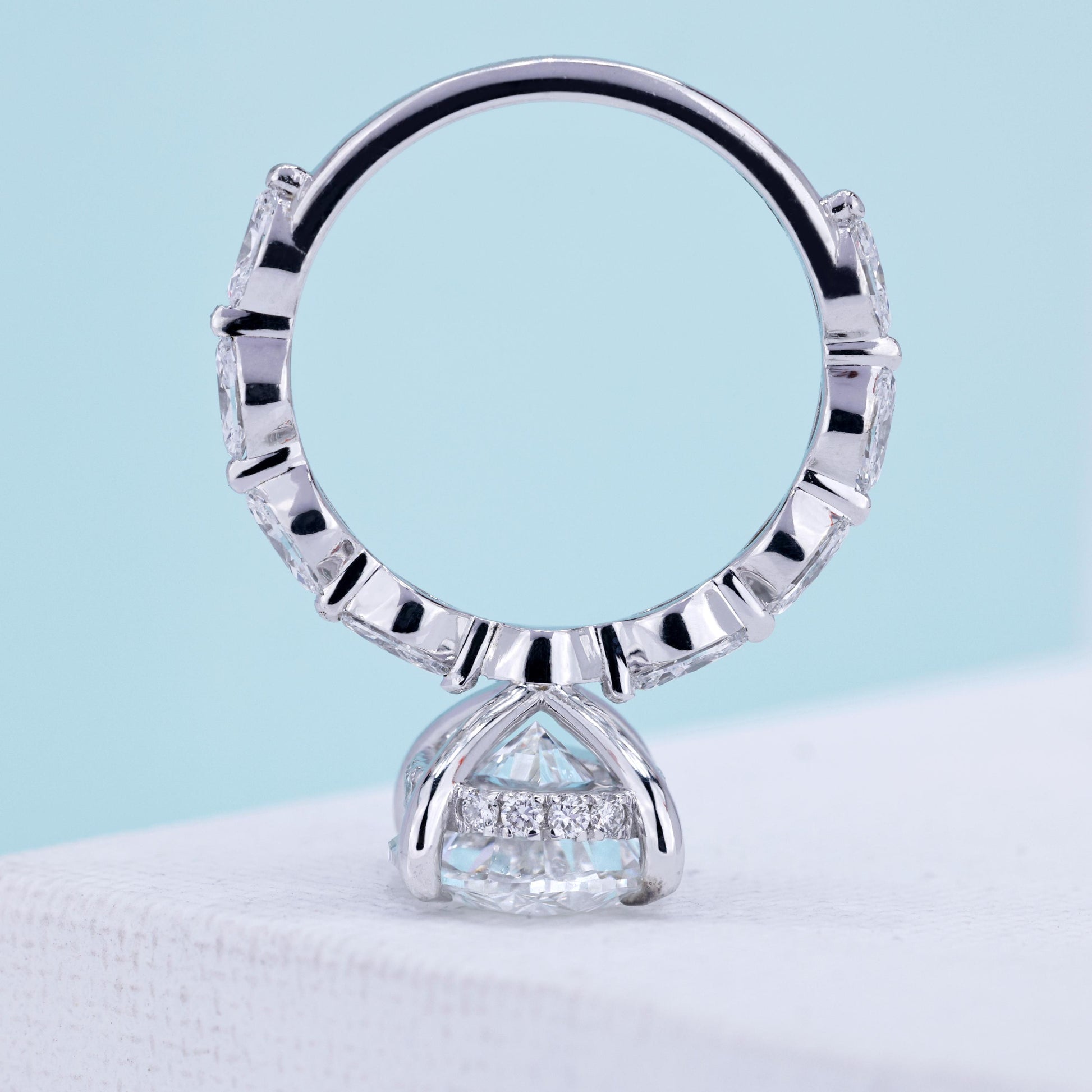 5 carat oval diamond engagement ring with marquise cut pavé band