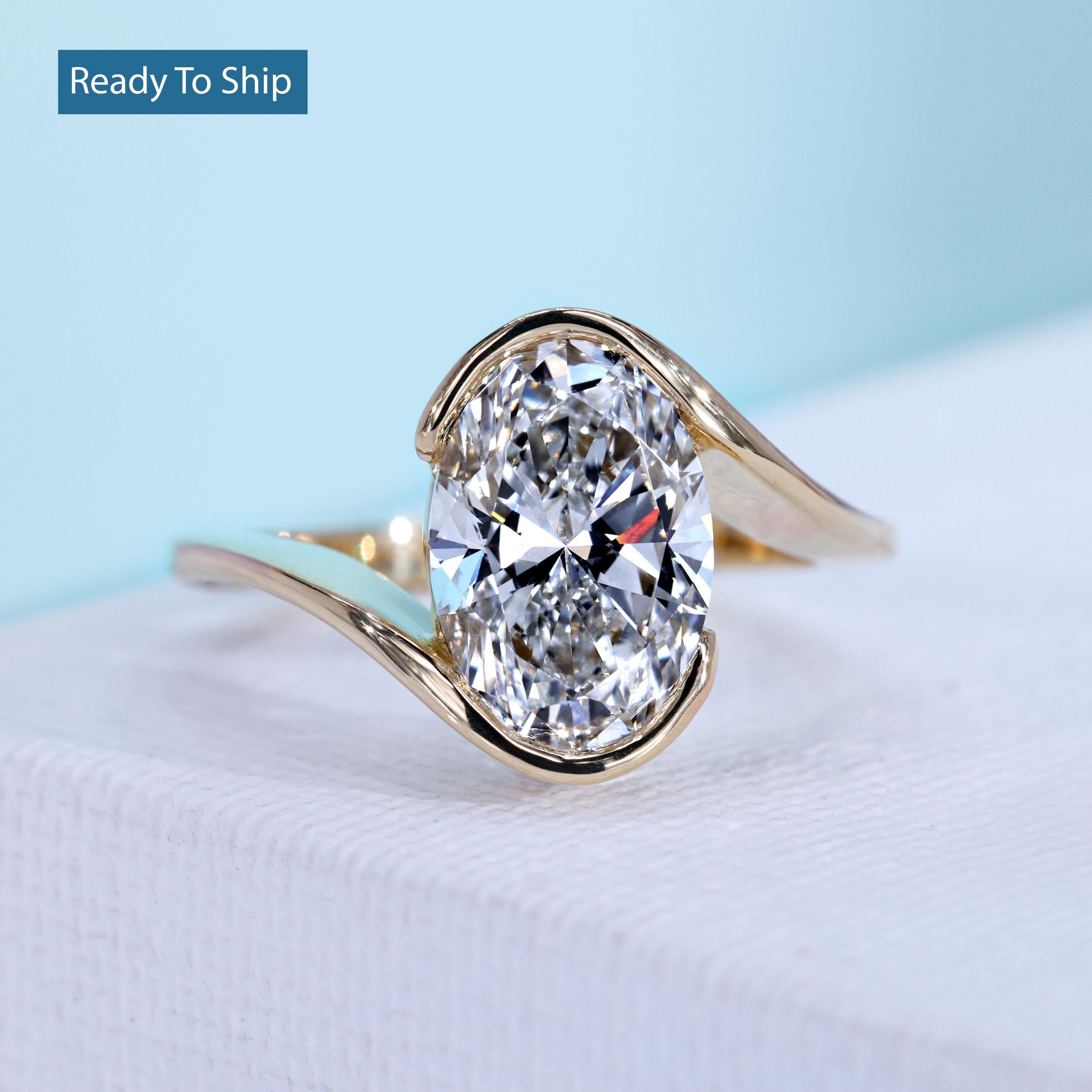 Bypass diamond ring with 3 carat oval diamond engagement design
