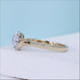 East west oval engagement ring featuring oval cut diamond solitaire