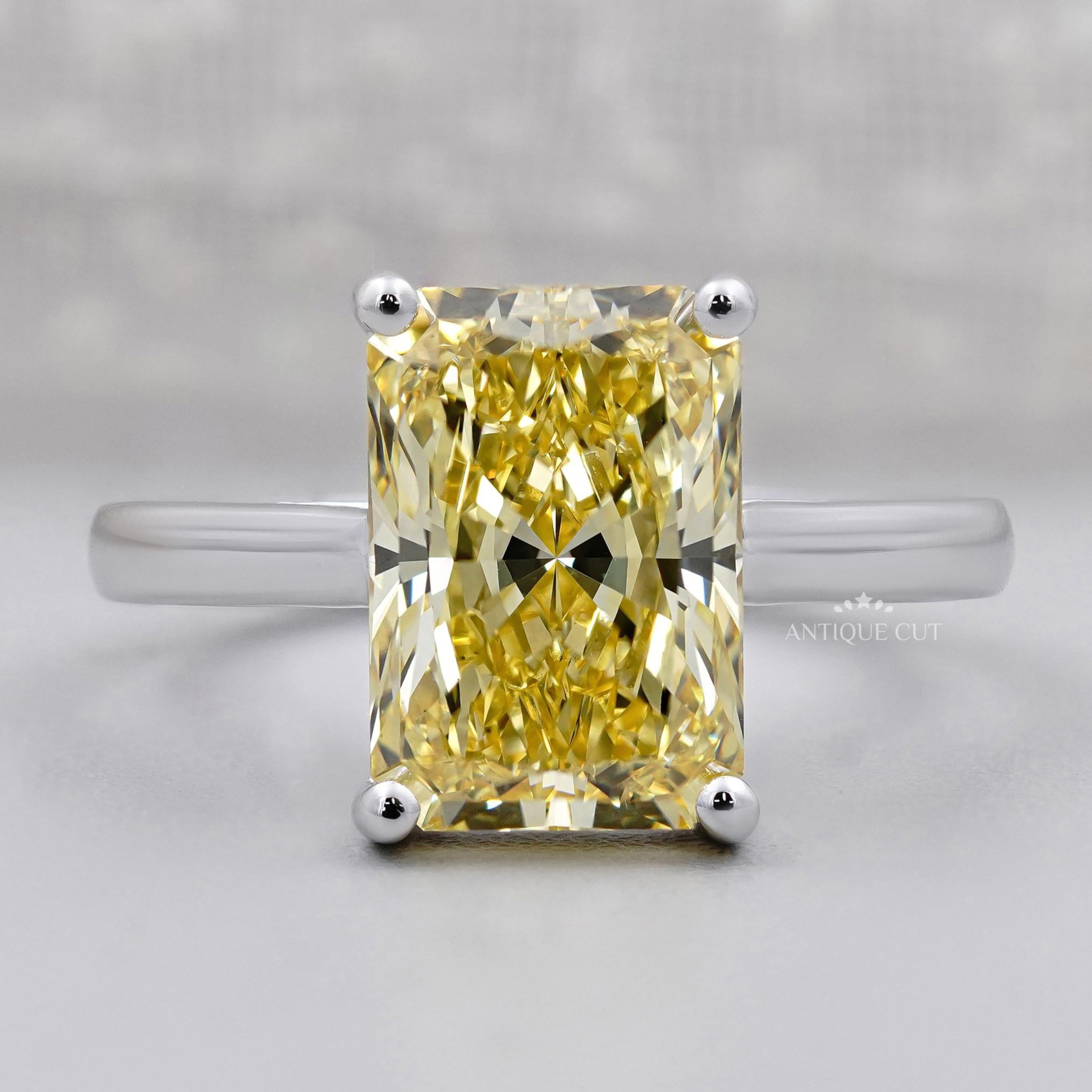 Lab grown yellow radiant solitaire diamond ring