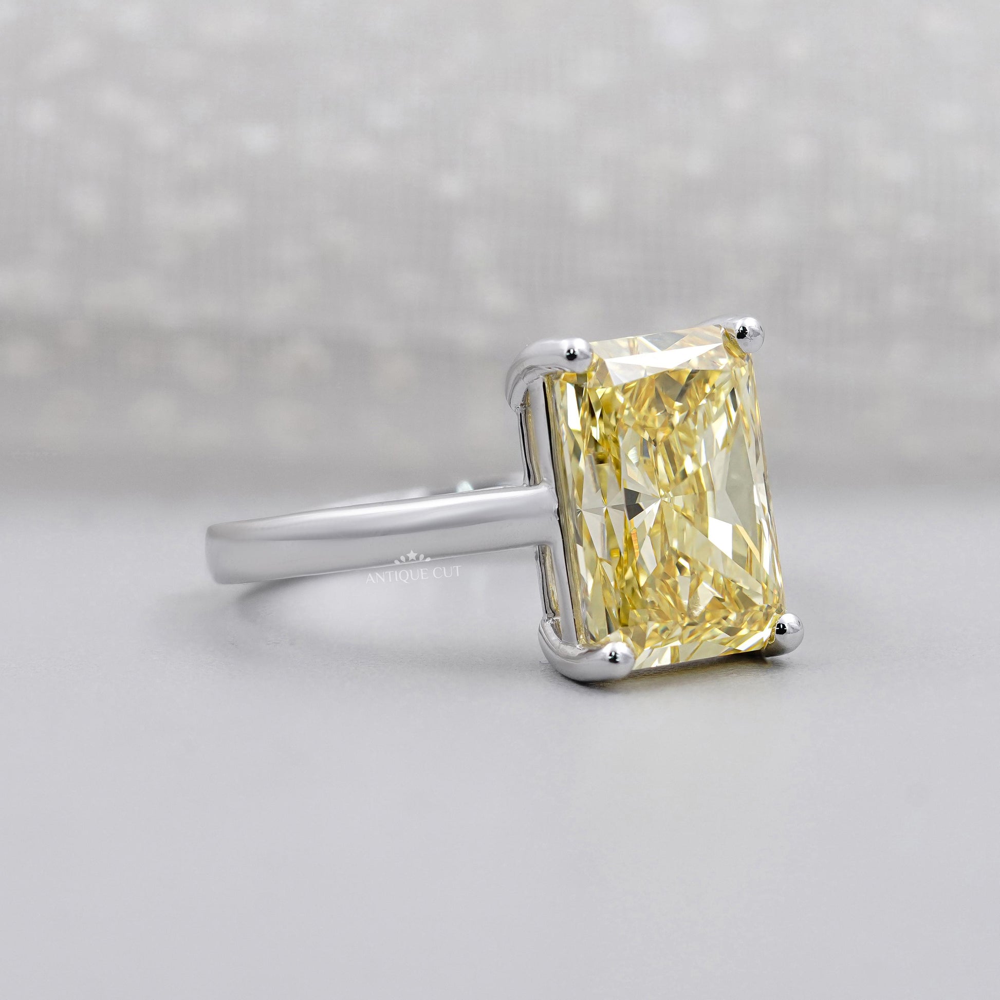 Antiquecut fancy yellow diamond engagement ring